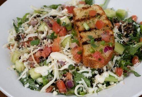 Order Mediterranean Caesar Salad food online from Green Mill Restaurant &Amp; Bar store, HASTINGS on bringmethat.com