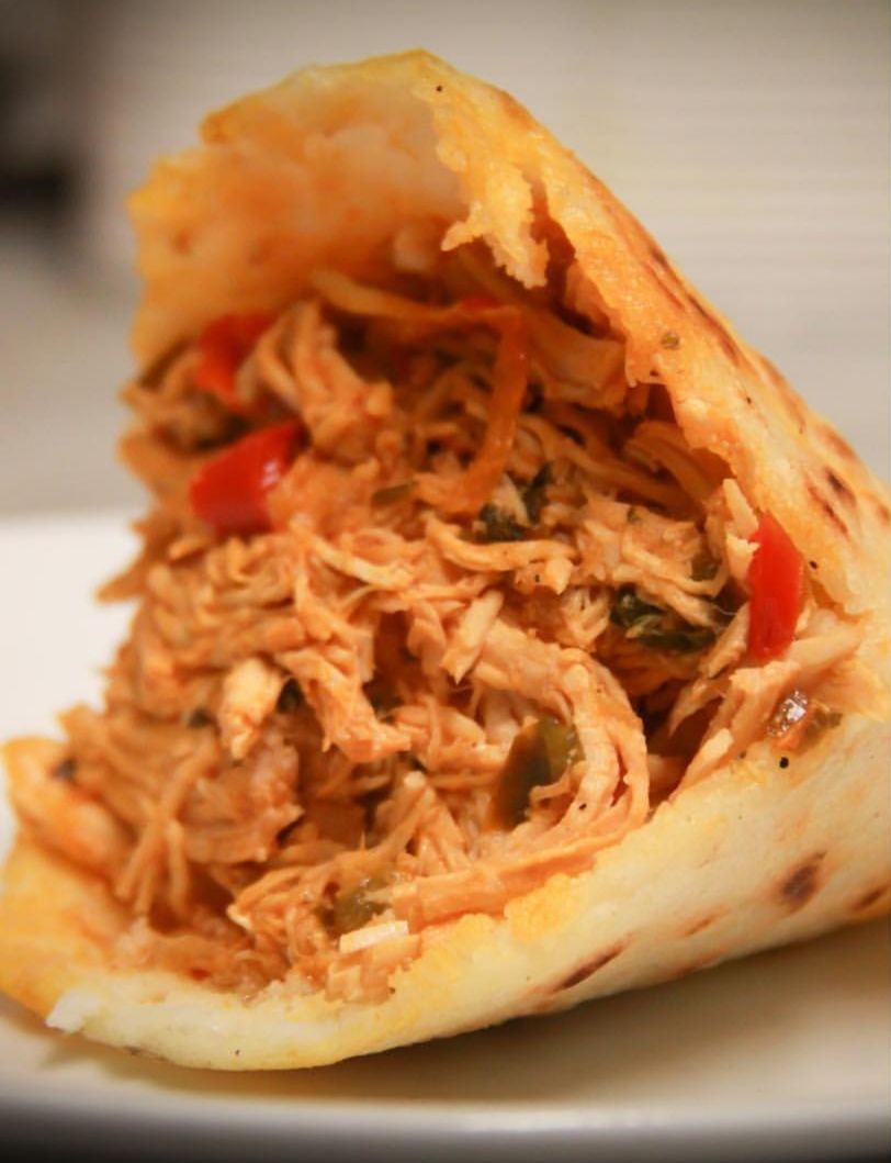 Order Pollo Mechado Arepa food online from Arepas Grill 21-19 Broadway Ave store, Astoria on bringmethat.com