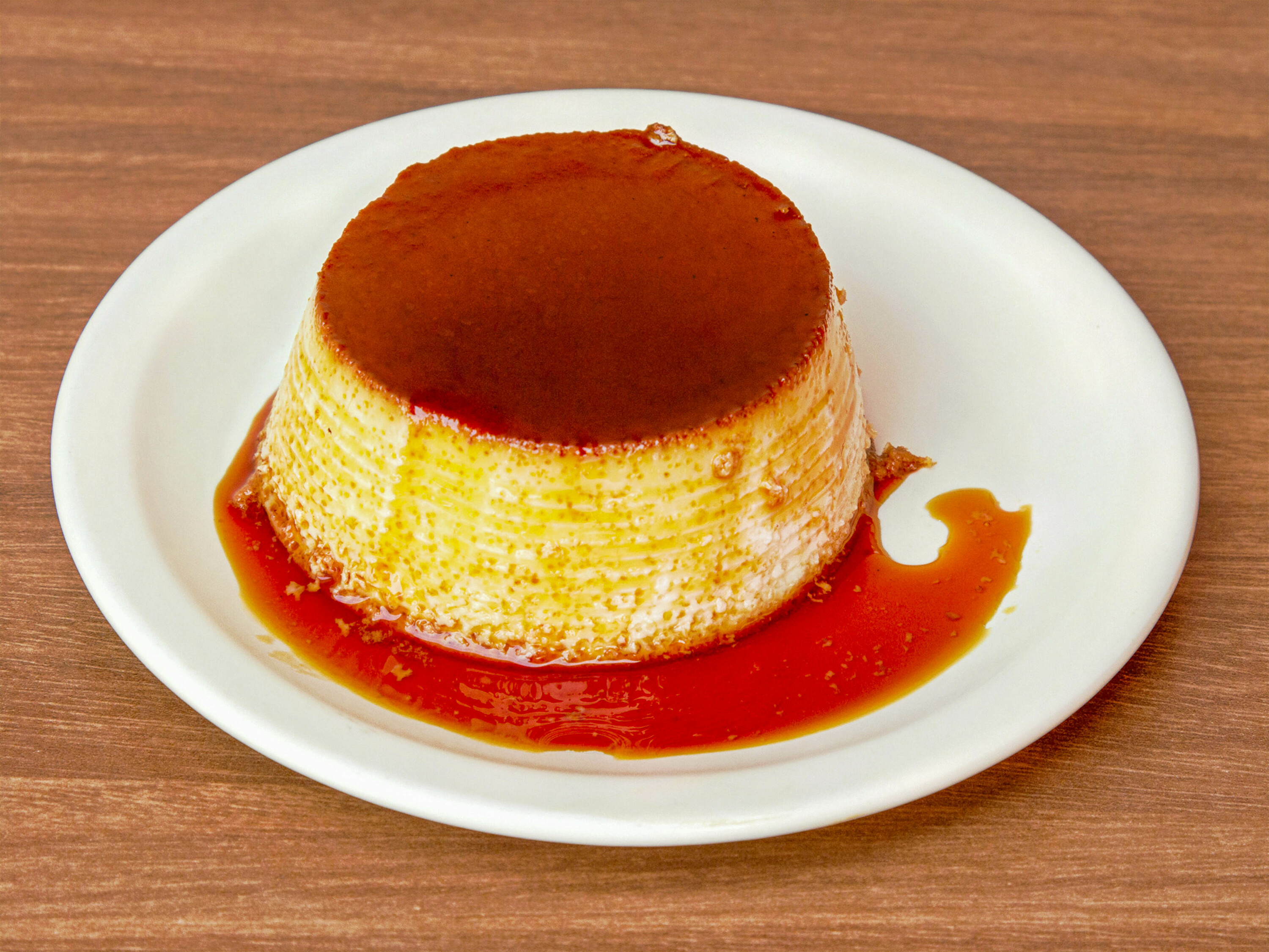 Order Flan food online from Amigo's Tequila Mexican Grill - Harvest Mill Way store, Knoxville on bringmethat.com
