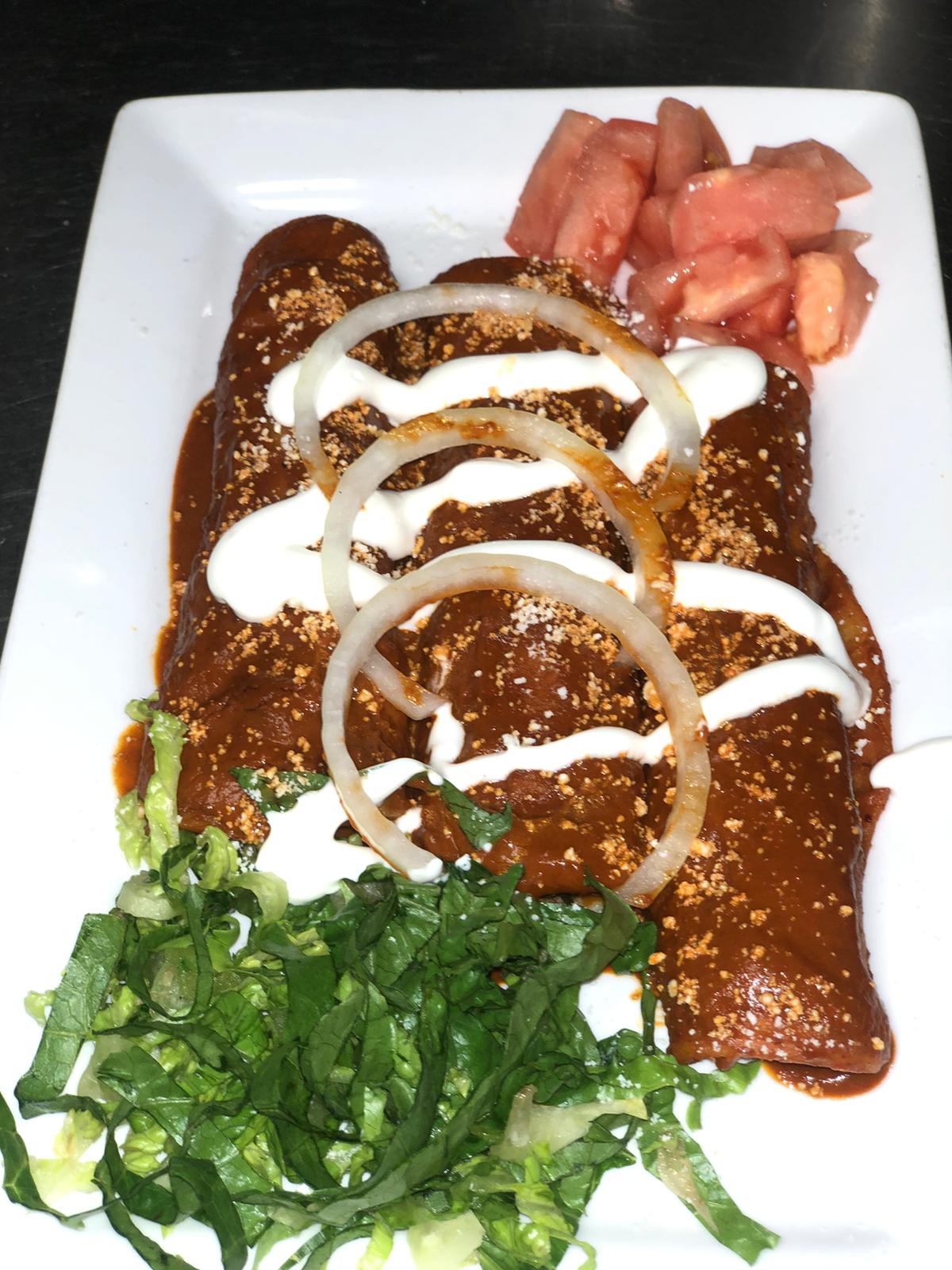 Order Pollo Enchilada food online from Casa Tacos Mexican Restaurant store, New York on bringmethat.com