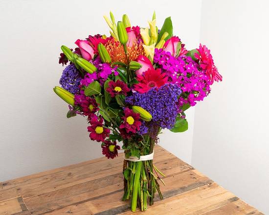 Order Vibrant Primary Colors Wrapped Bouquet food online from @Flowers store, Palm Desert on bringmethat.com