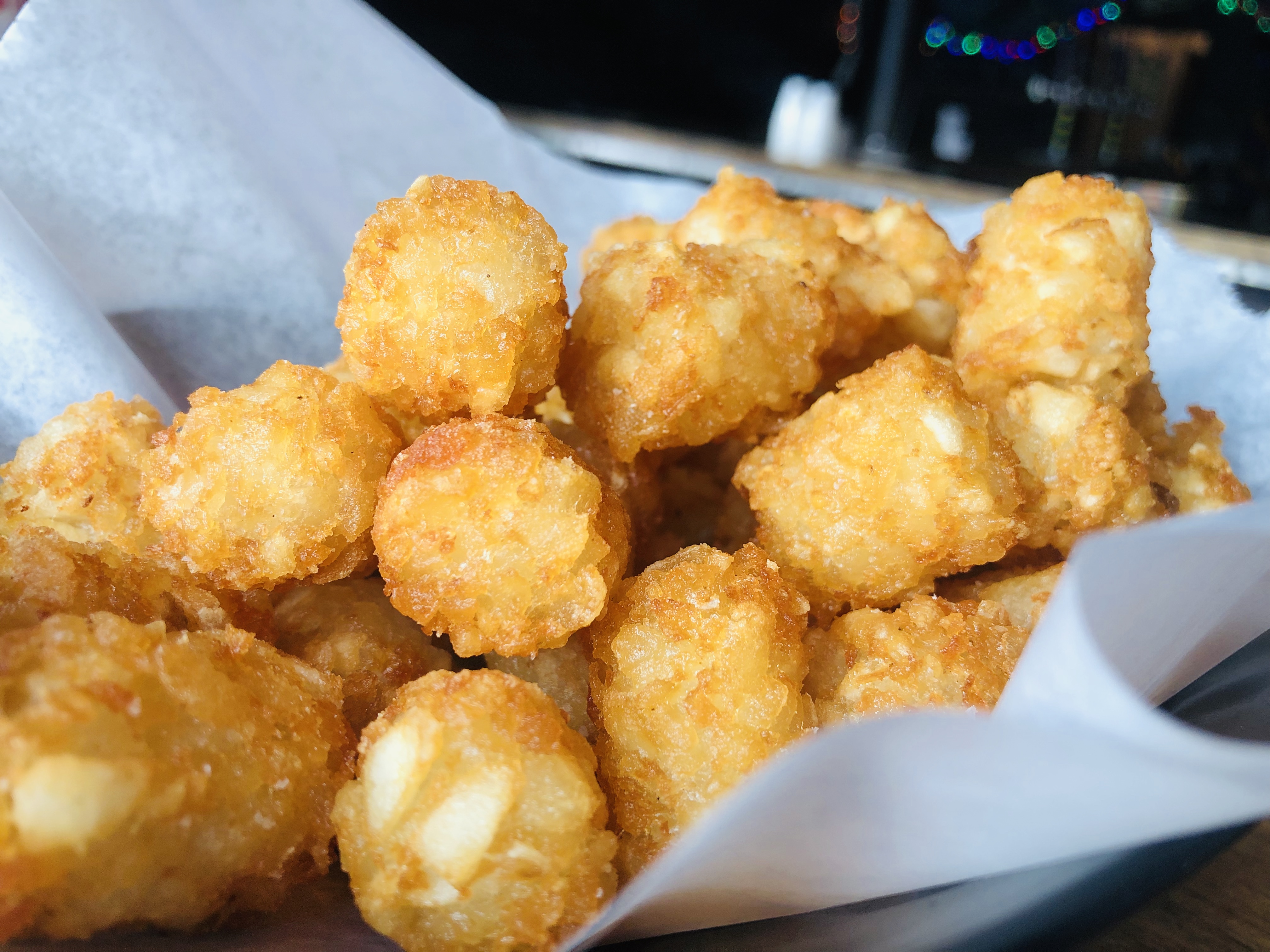 Order Plain Tots food online from Nola Bar & Kitchen store, Chicago on bringmethat.com