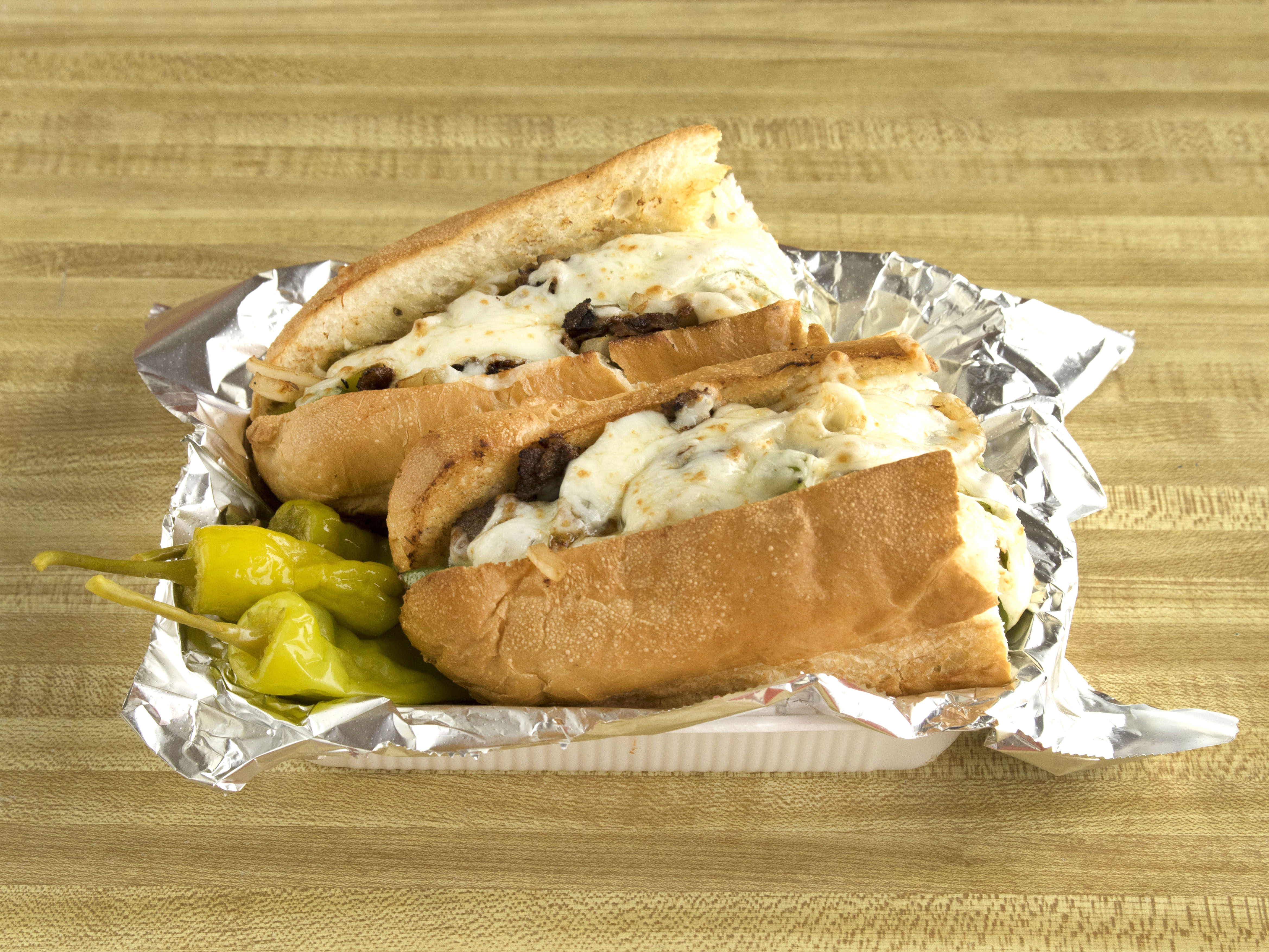 Order Philly Steak Footlong Sub food online from Giant Pizza King store, San Diego on bringmethat.com