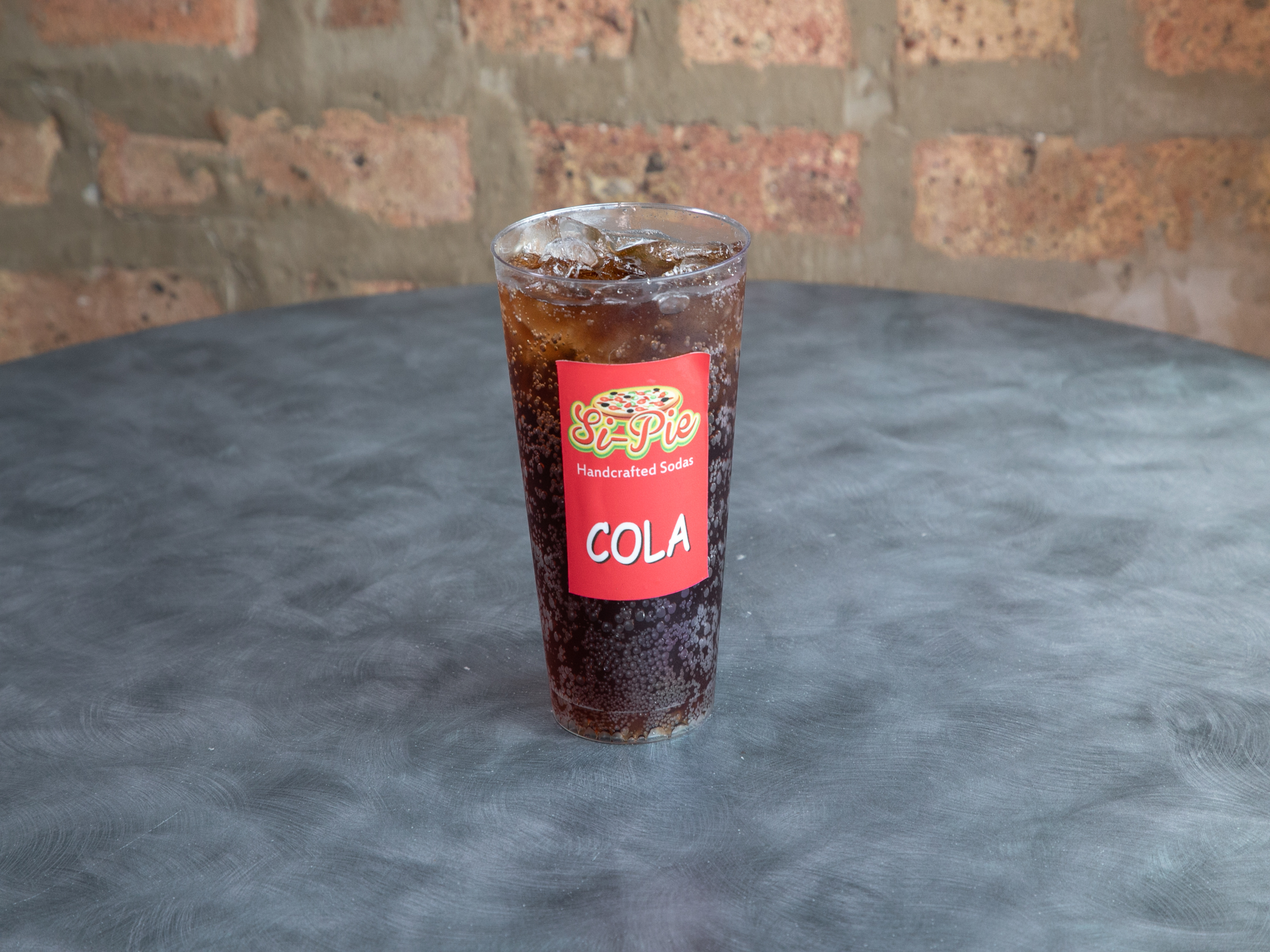 Order 12 oz. Coke food online from Si-Pie Pizzeria store, Chicago on bringmethat.com