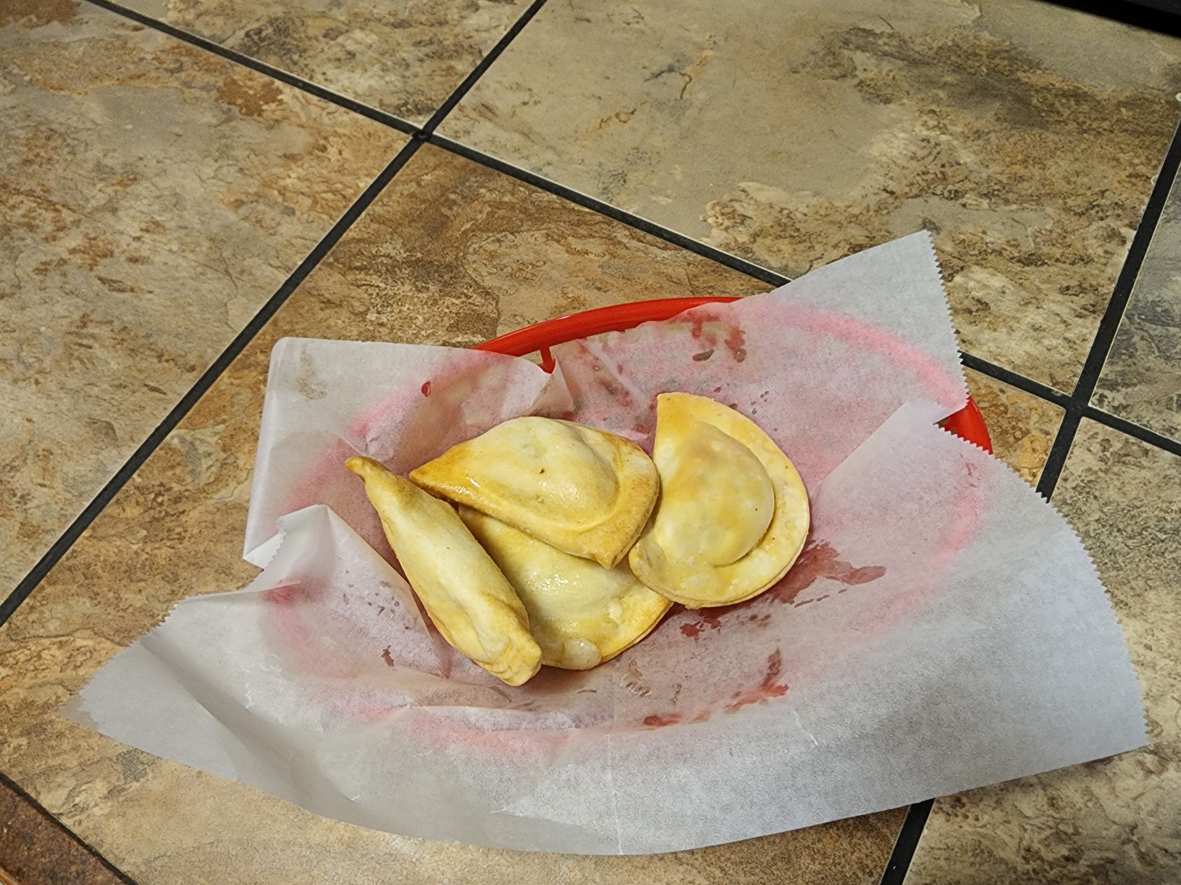 Order Pierogies - 4 Pieces food online from Roma Pizza store, Hellertown on bringmethat.com