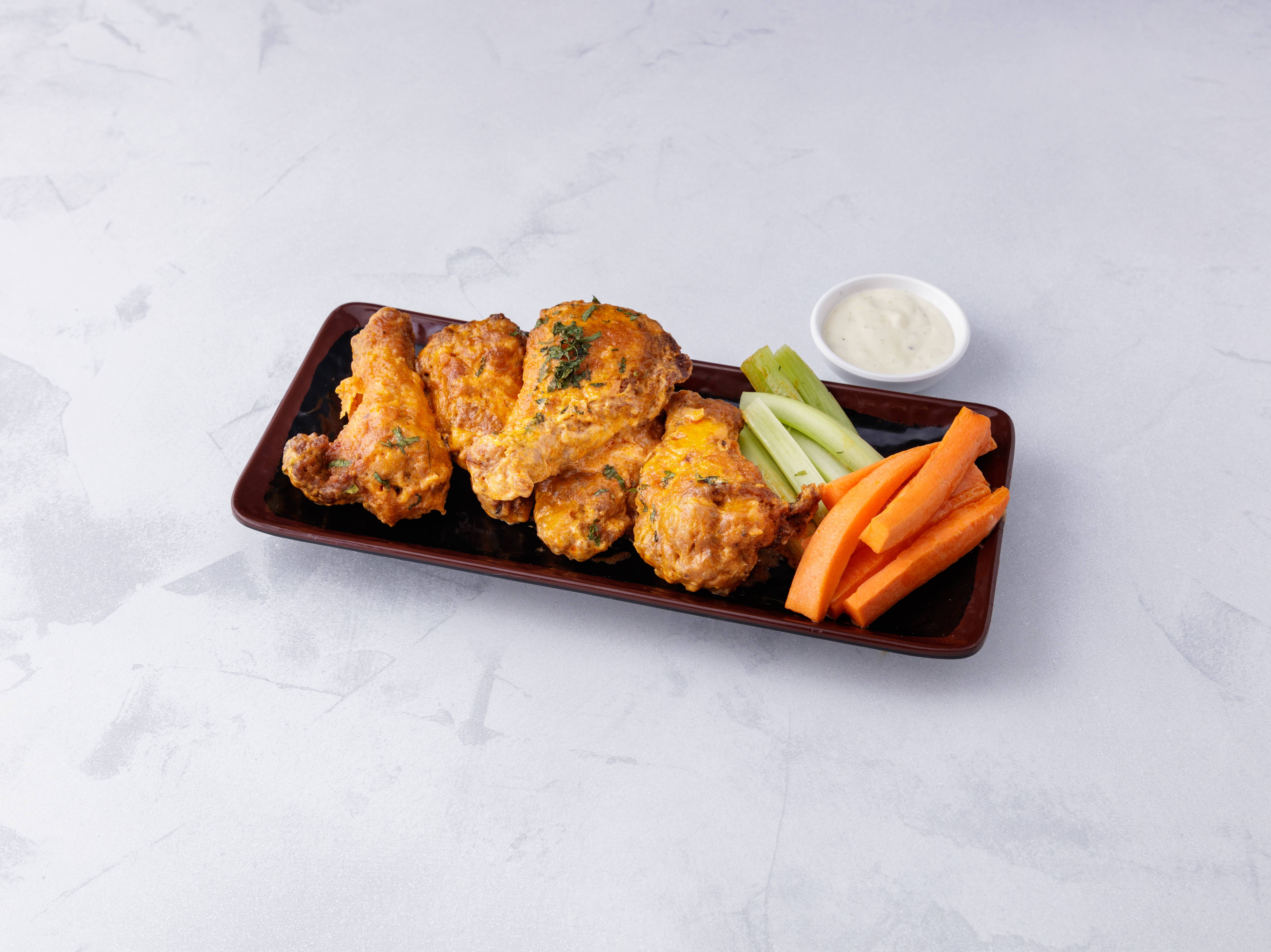 Order Buffalo Wings food online from Tippin inn bar & grill store, Astoria on bringmethat.com