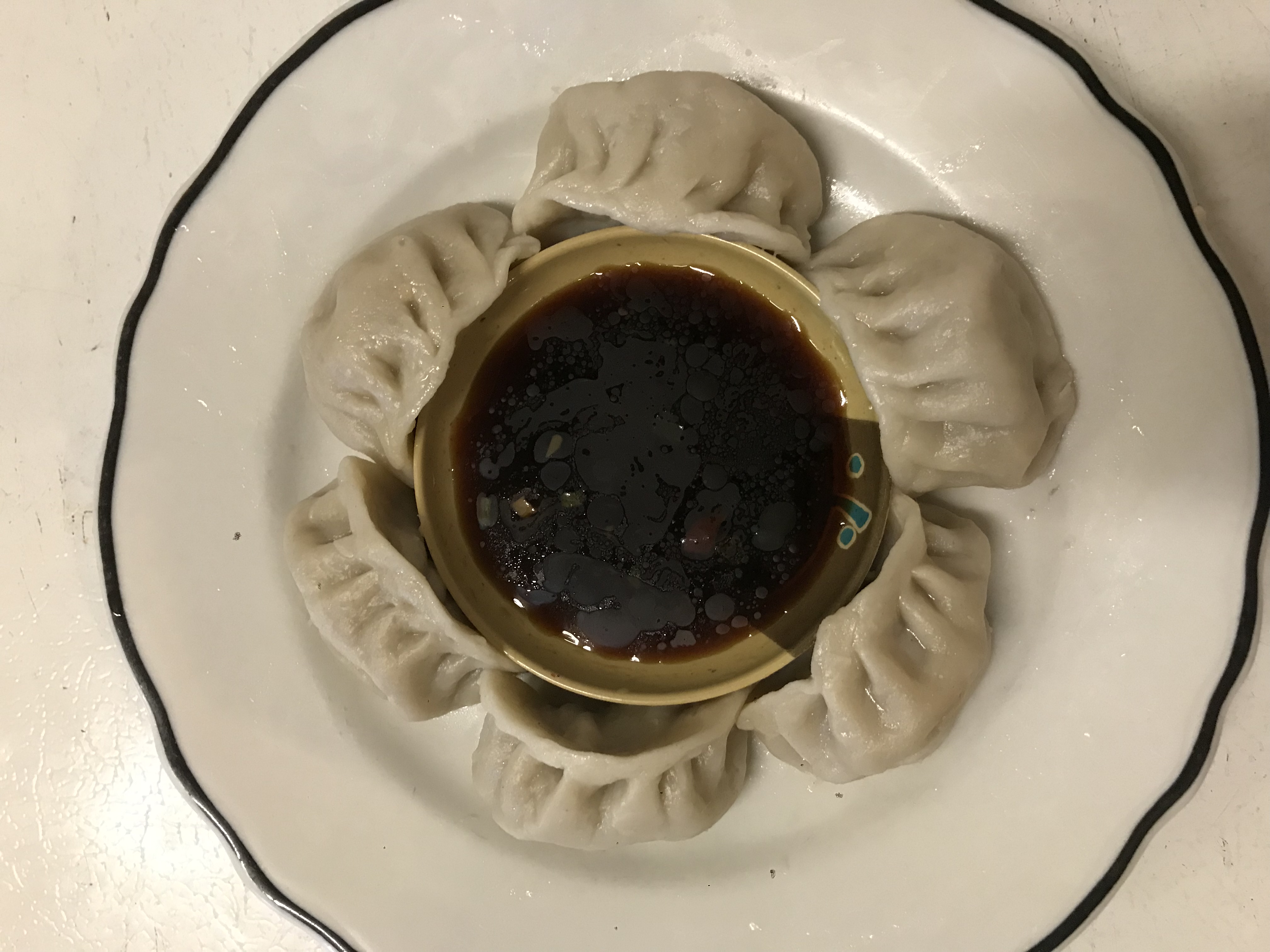 Order 9. Steamed Dumplings food online from Grand China Restaurant store, Columbia on bringmethat.com