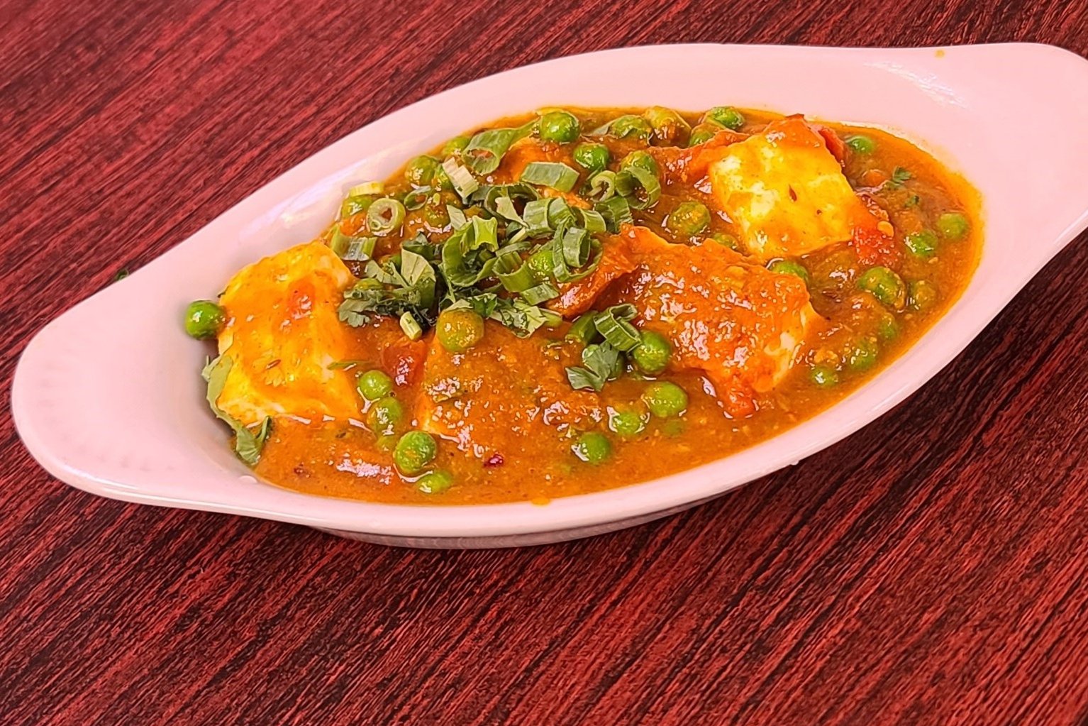Order Matar Paneer food online from Om Indian Cuisine store, San Francisco on bringmethat.com