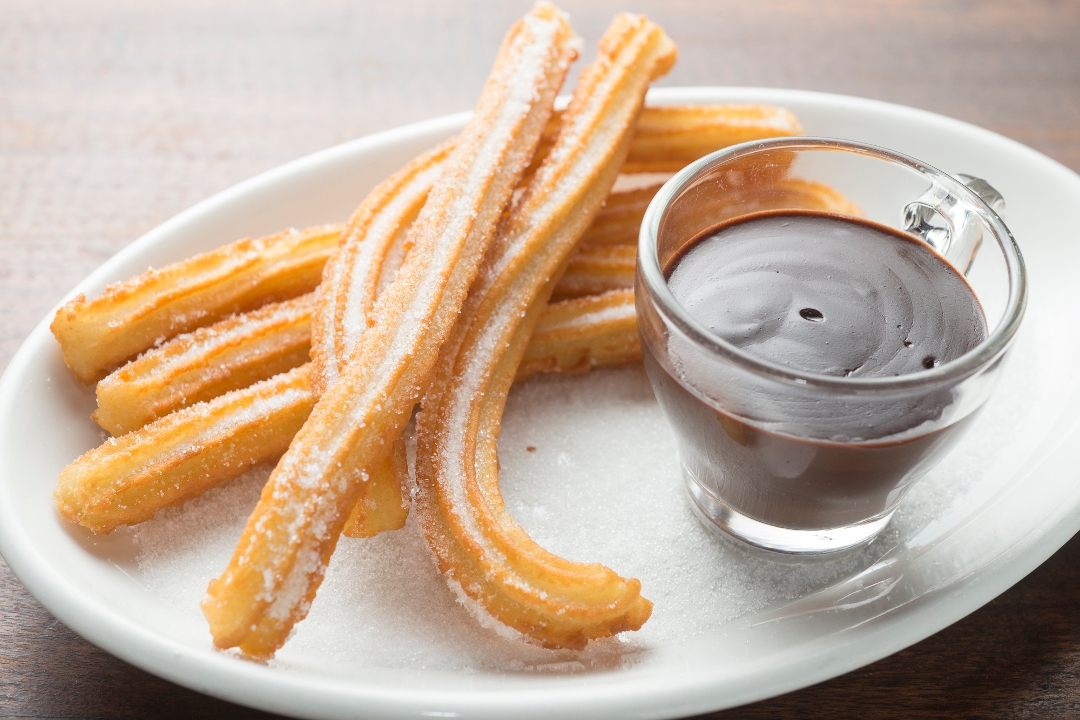Order Churros con Chocolate food online from Socarrat Paella Bar- East store, New York on bringmethat.com