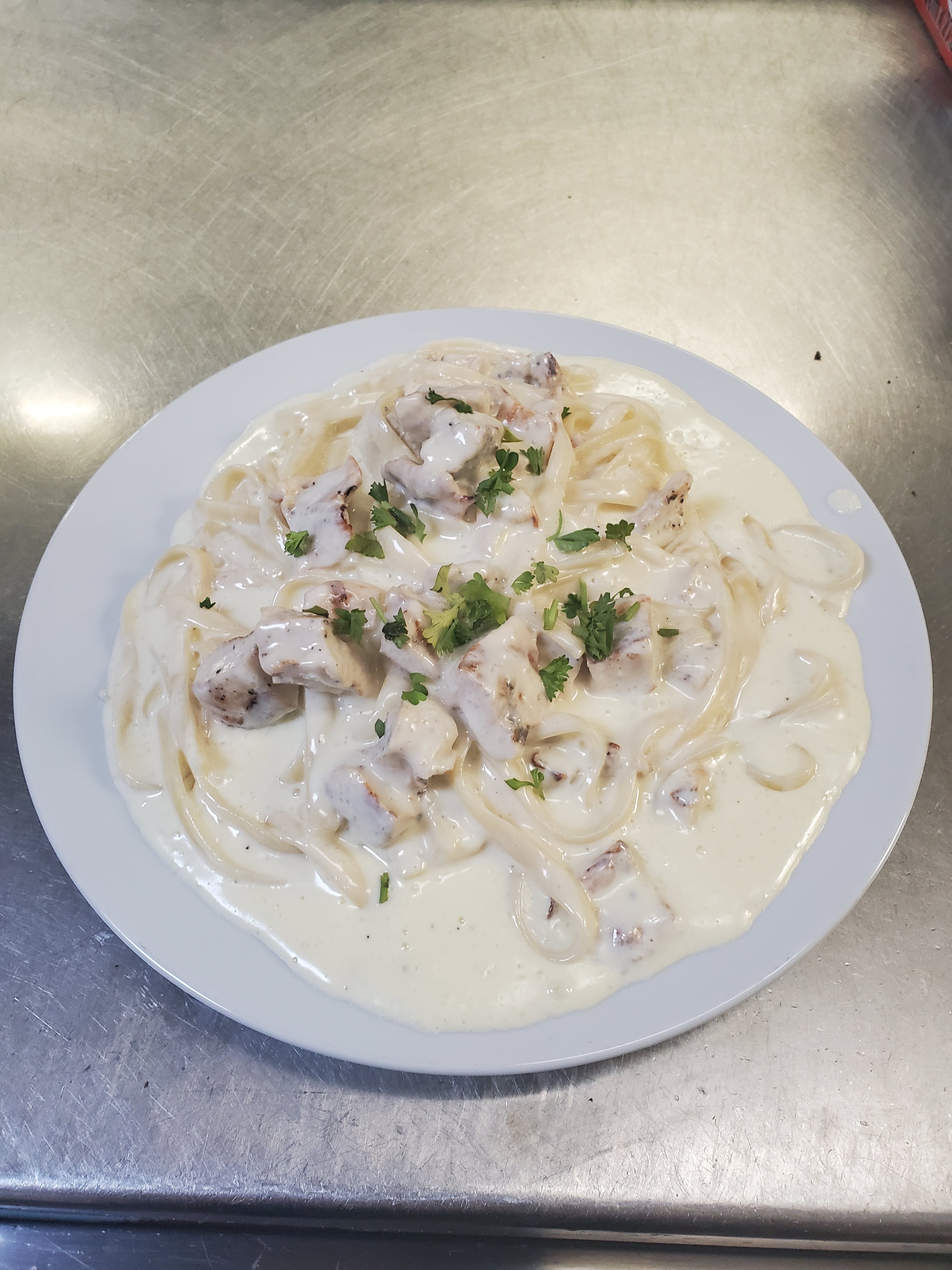 Order Fettuccine Alfredo with Chicken - Pasta food online from Pizza Cucina store, Oswego on bringmethat.com