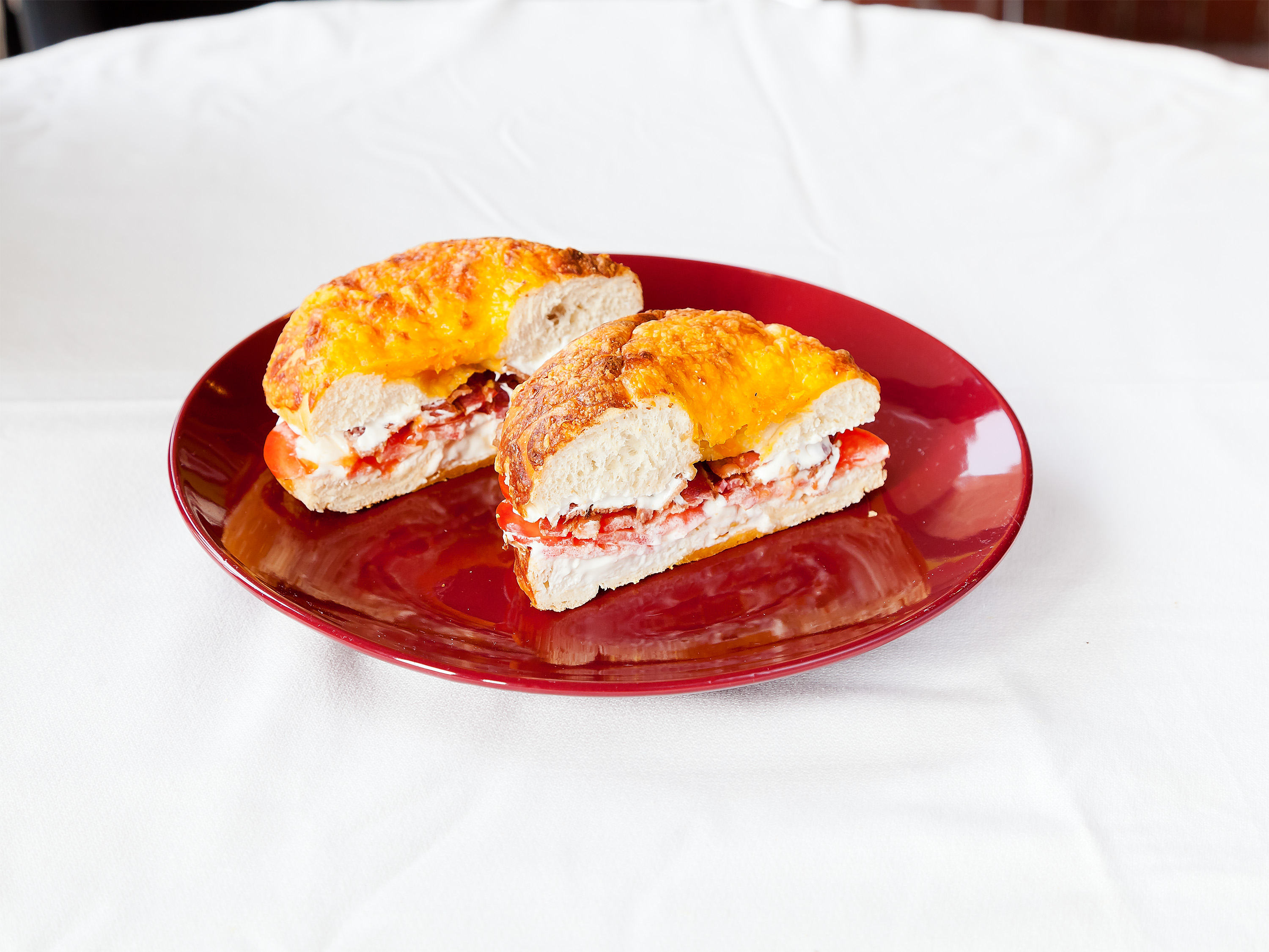 Order Bagel with Bacon Tomato, Cream Cheese food online from Rossi Cafe & Deli store, Concord on bringmethat.com