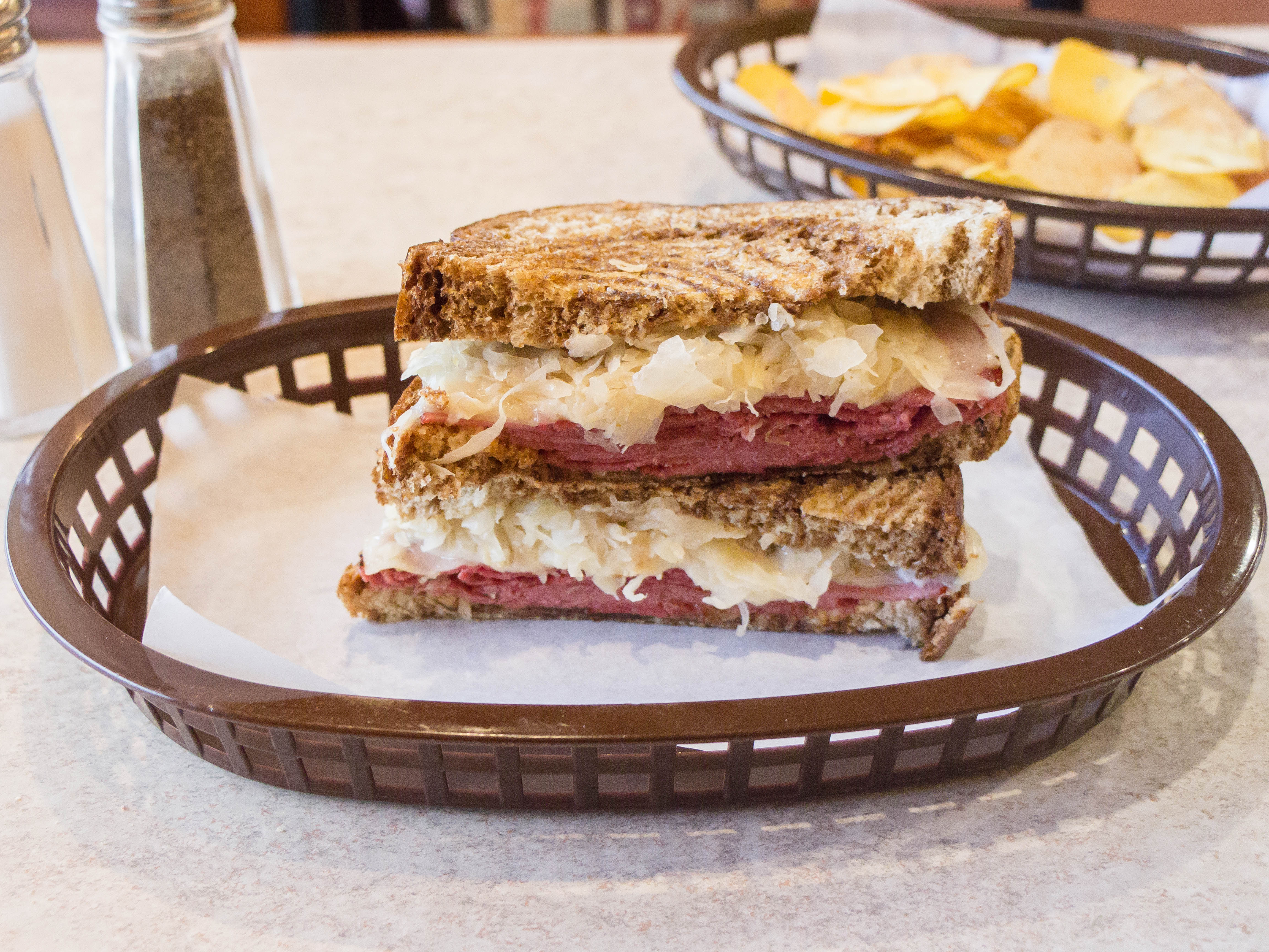 Order Reuben on Rye Sandwich food online from NY Bagel Cafe Deli store, Burlington on bringmethat.com