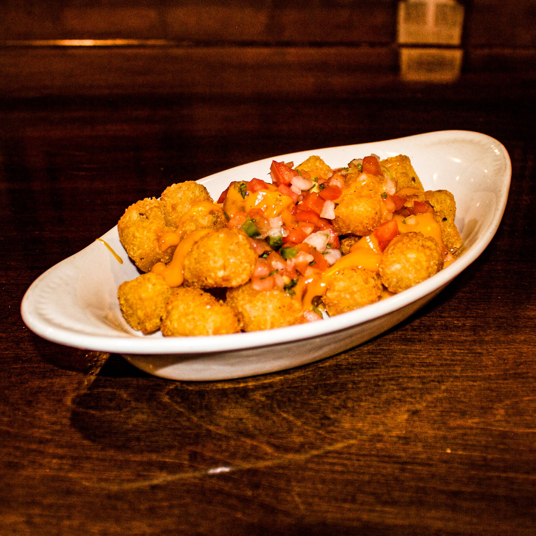 Order Fire Tots - Appetizer food online from Old Town Pub store, Chicago on bringmethat.com
