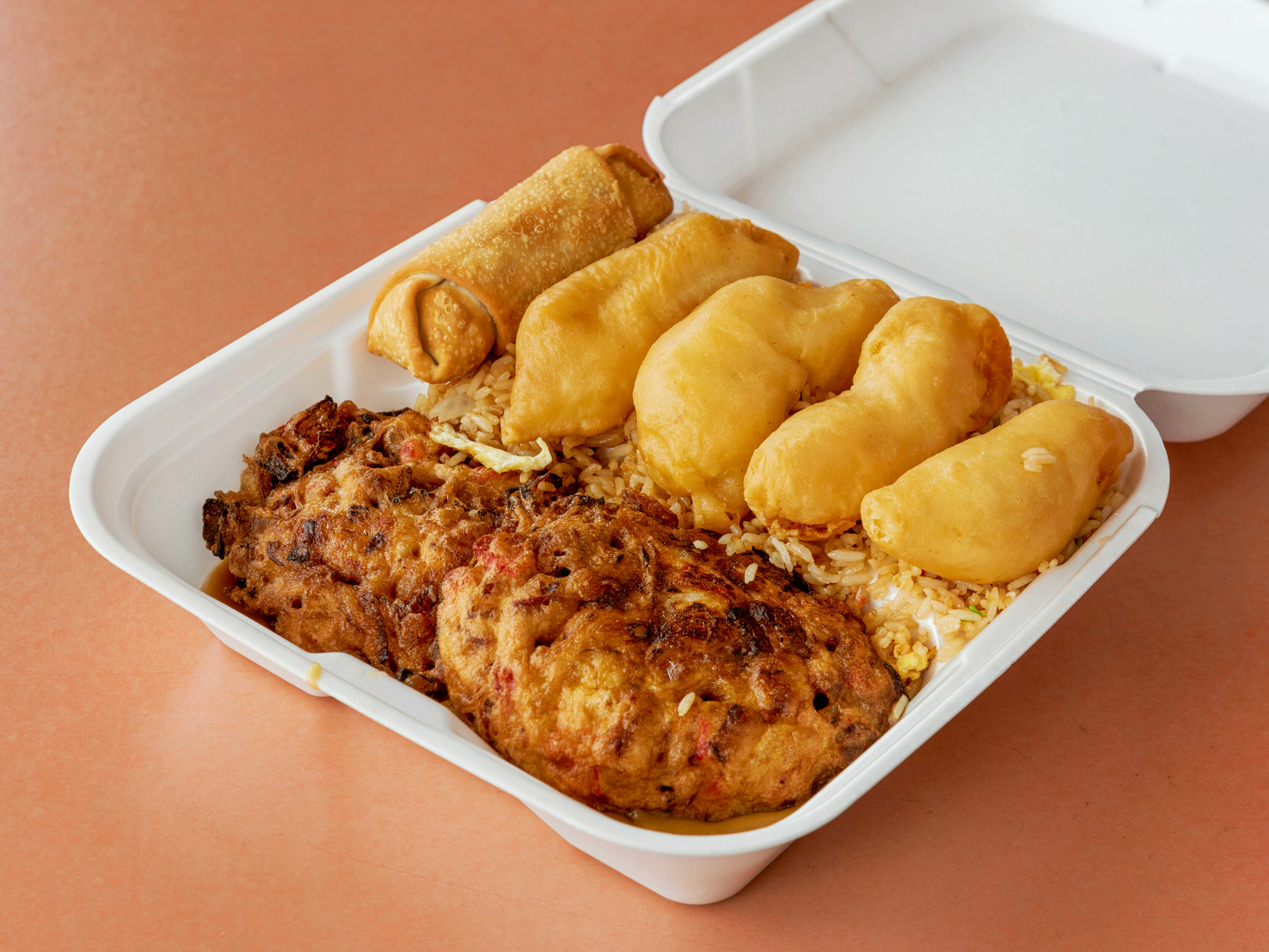 Order H13. Pork Egg Foo Young, 4 Piece Chicken Fingers and an Egg Roll Combo Plate food online from May S Cafe Chinese Food store, Medford on bringmethat.com