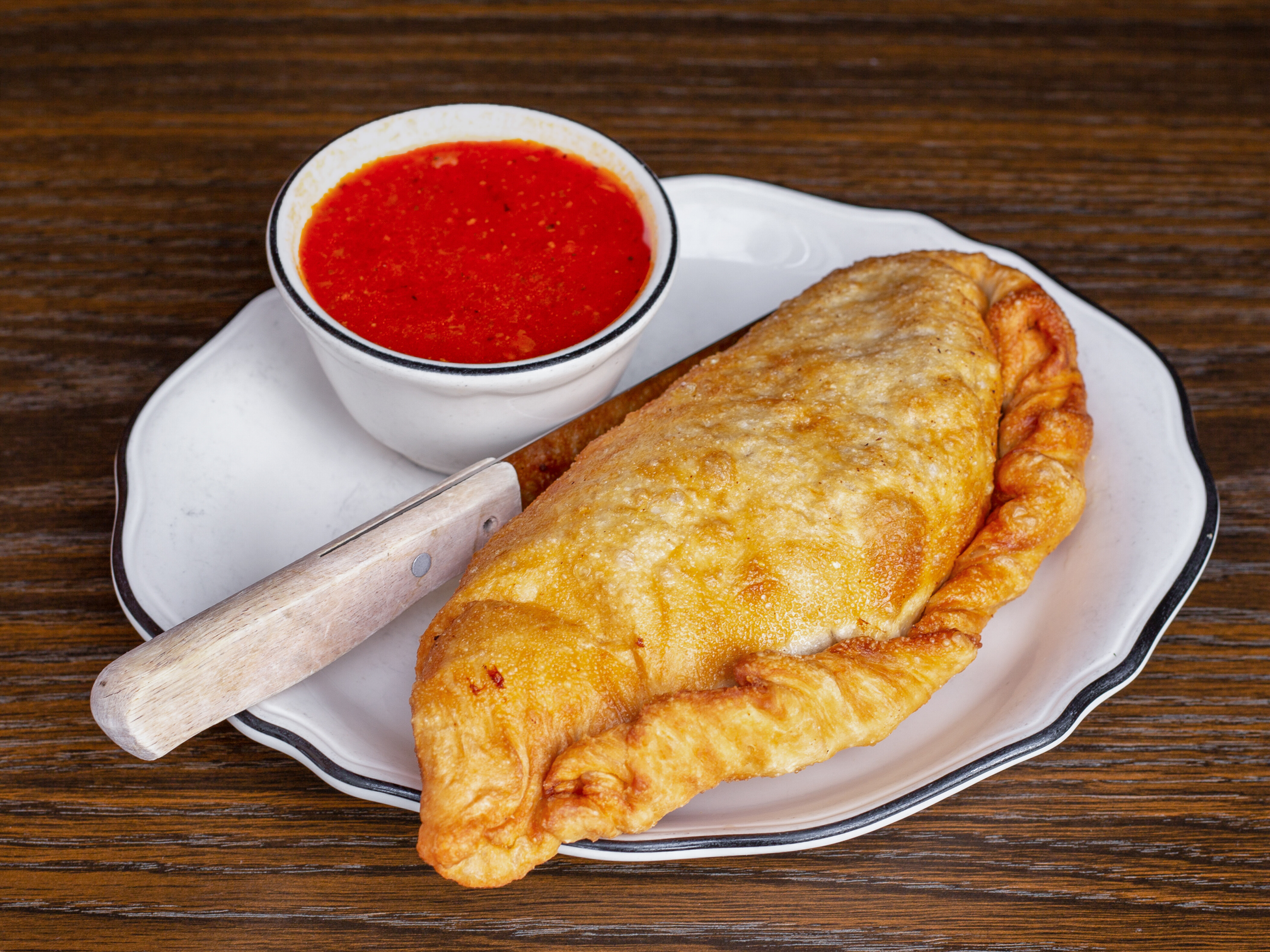 Order Baked Panzerotti food online from Marios store, Dubuque on bringmethat.com
