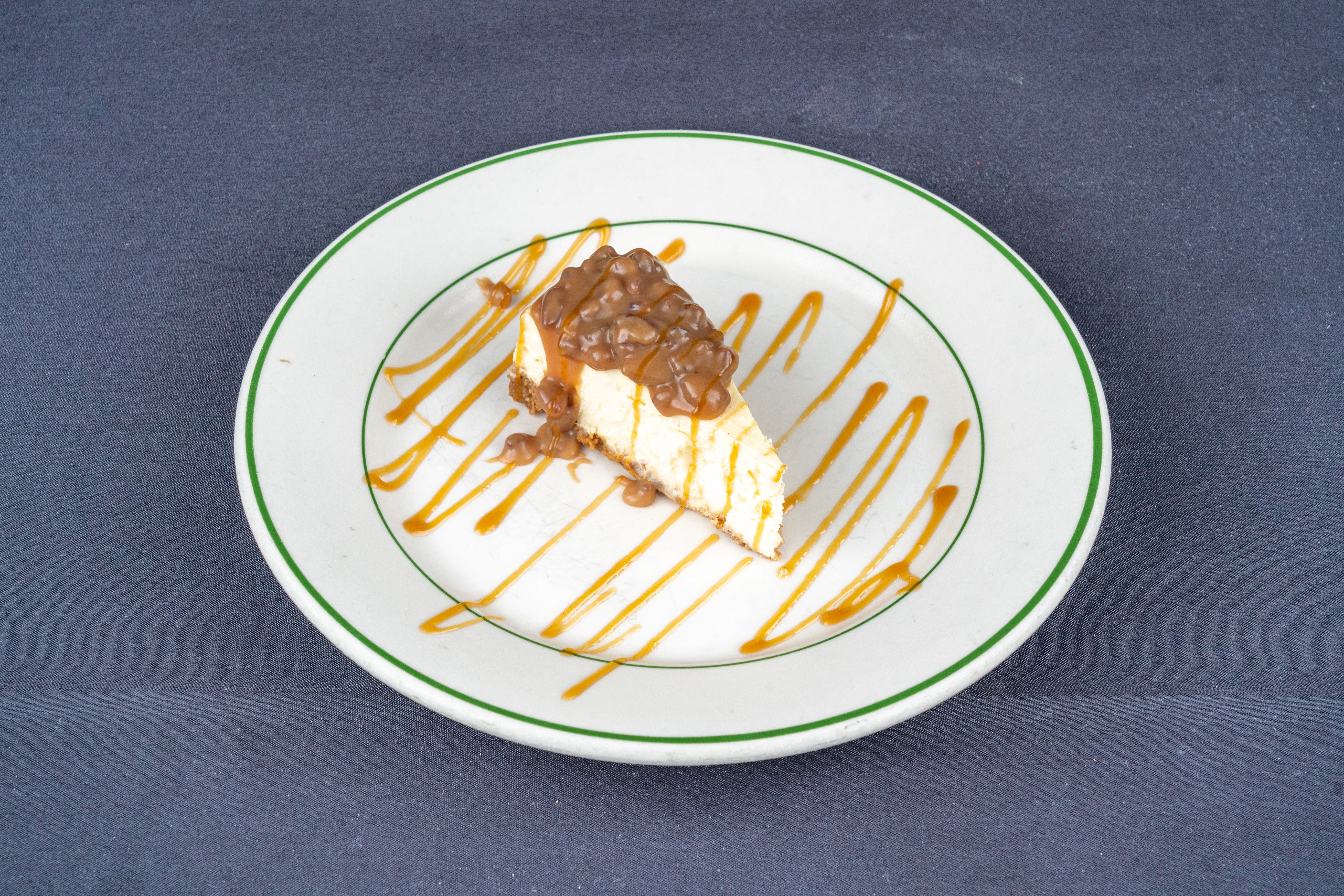 Order Pecan Praline Cheesecake - Dessert food online from Birraporetti's store, Friendswood on bringmethat.com