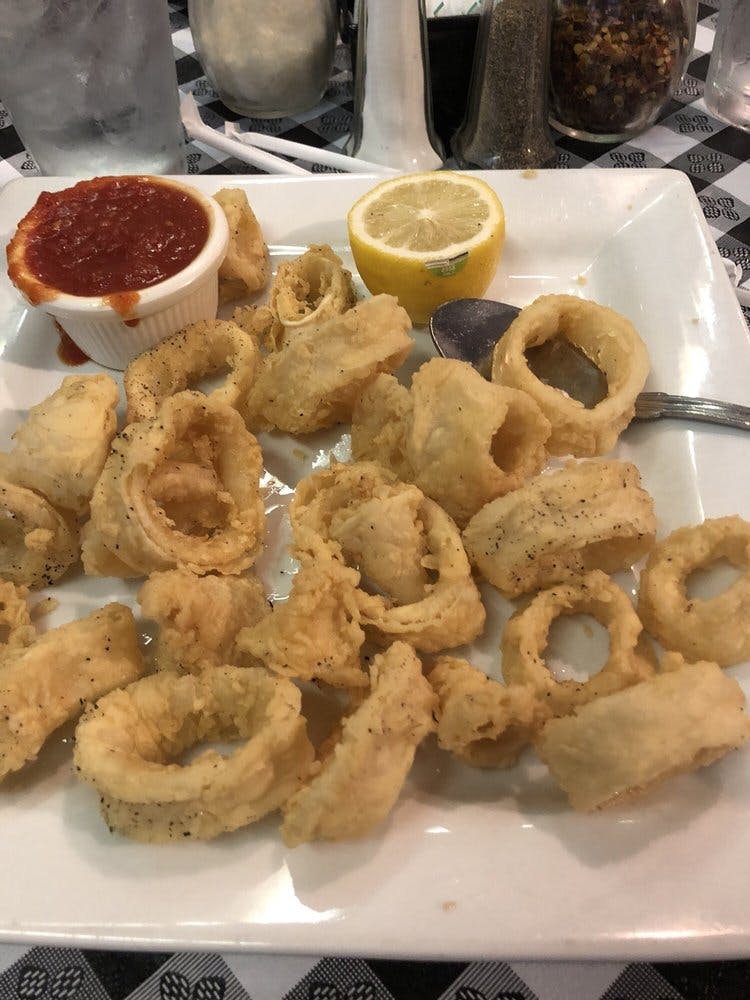 Order Fried Calamari - Appetizer food online from Macaluso's Italian Restaurant store, Fort Worth on bringmethat.com