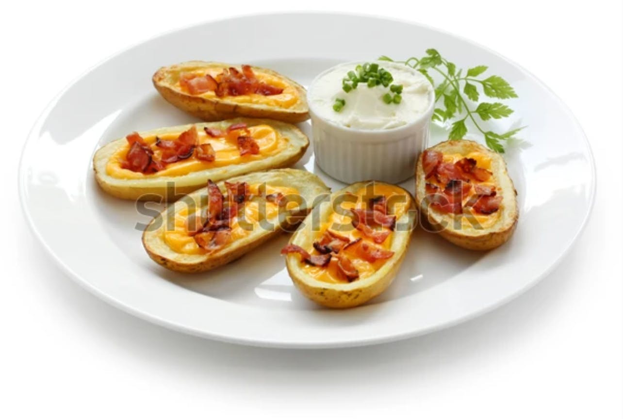 Order Loaded Potato Skins - Appetizer food online from Big D Pizza store, Clyde on bringmethat.com