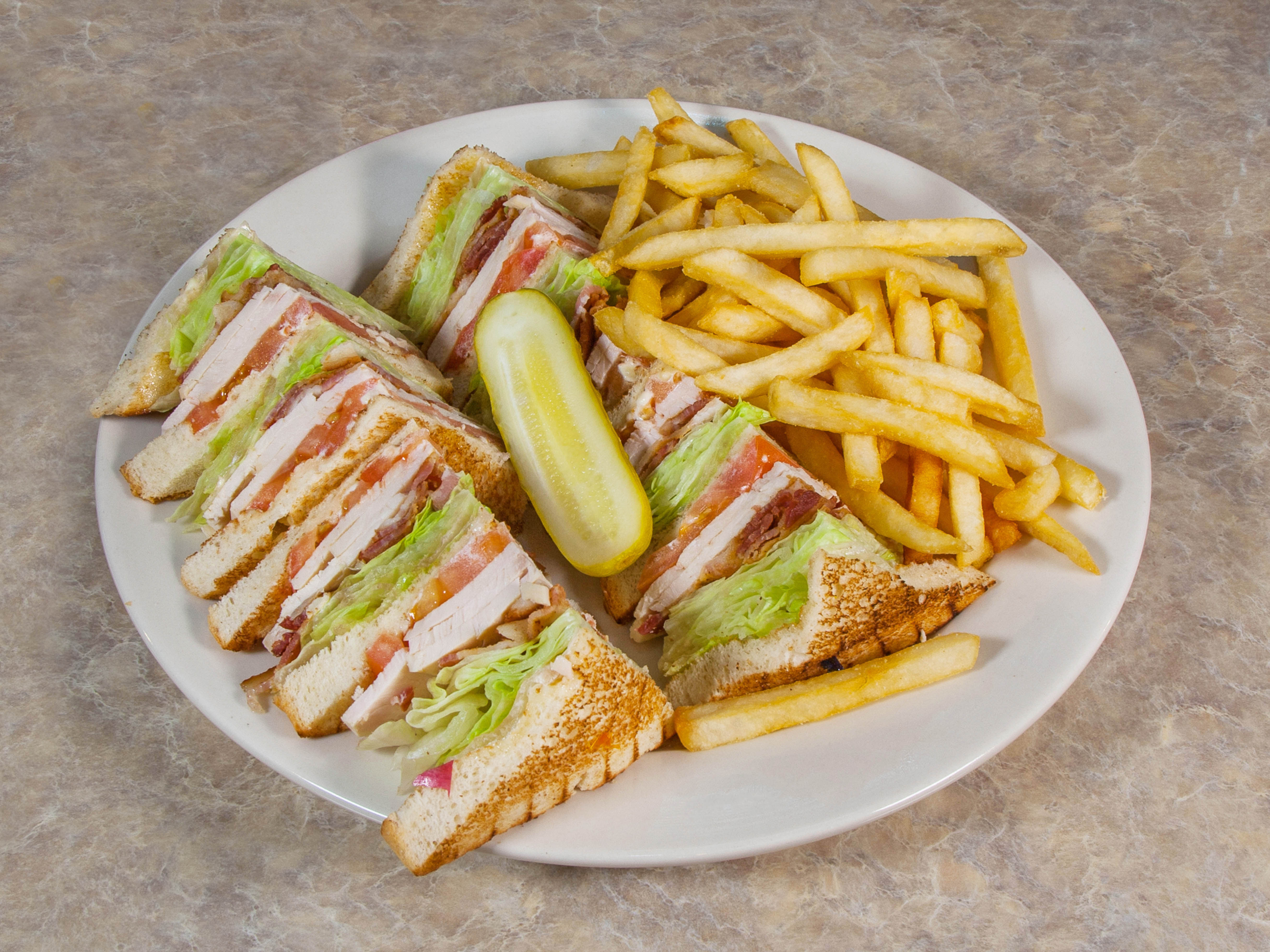 Order Turkey Club Sandwich food online from Omega Restaurant store, Downers Grove on bringmethat.com