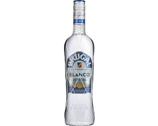 Order Brugal Extra Dry White Rum, 750ml  food online from Babaro Liquor Store store, Peabody on bringmethat.com