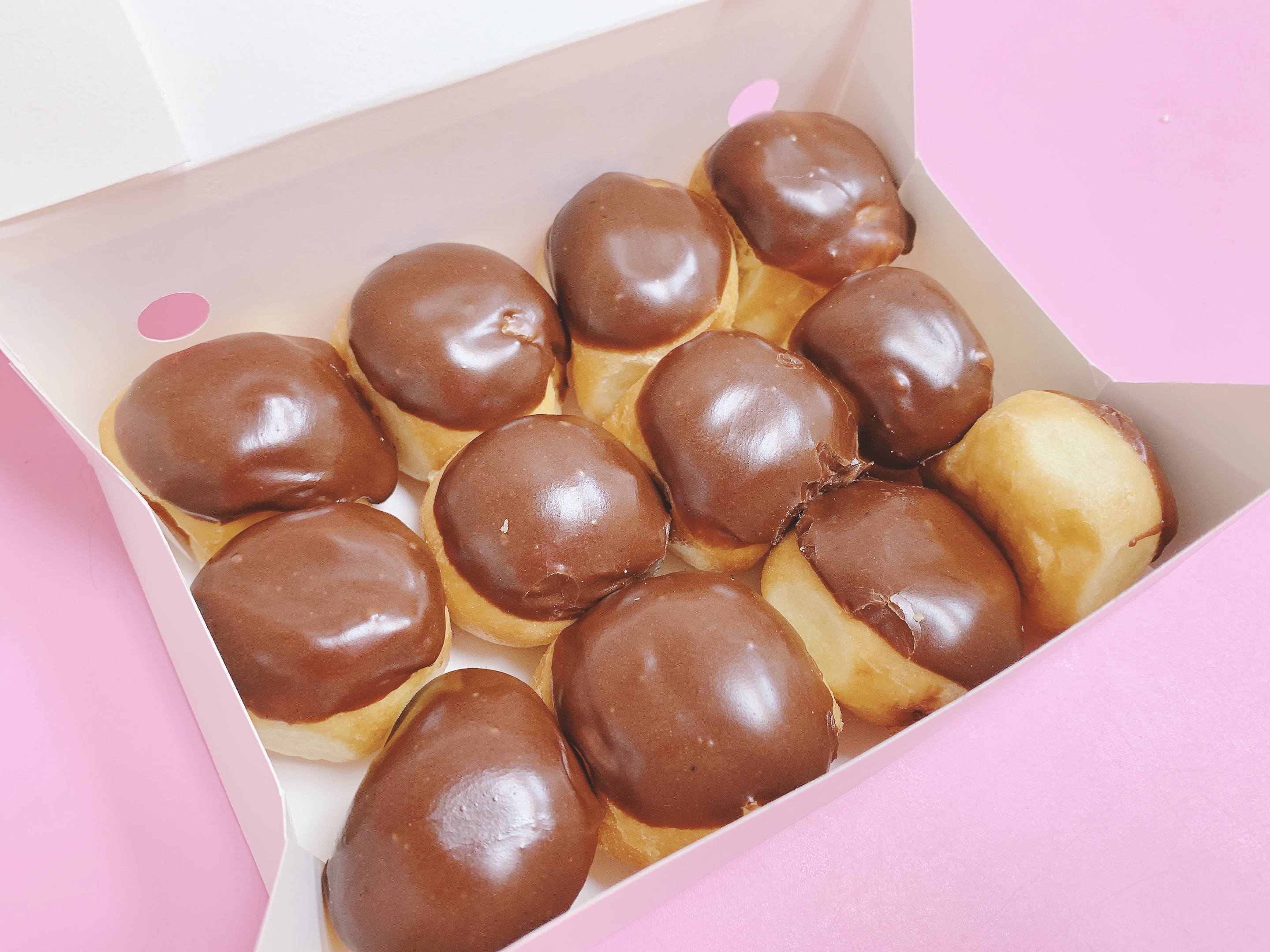 Order One Dozen Chocolate Donut Hole  food online from Bakers Dozen Donuts store, Sachse on bringmethat.com