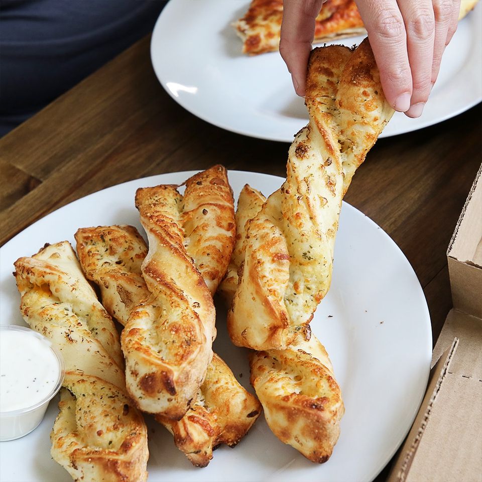 Order 3 Garlic Parmesan Twists  food online from Round Table Pizza store, Union City on bringmethat.com