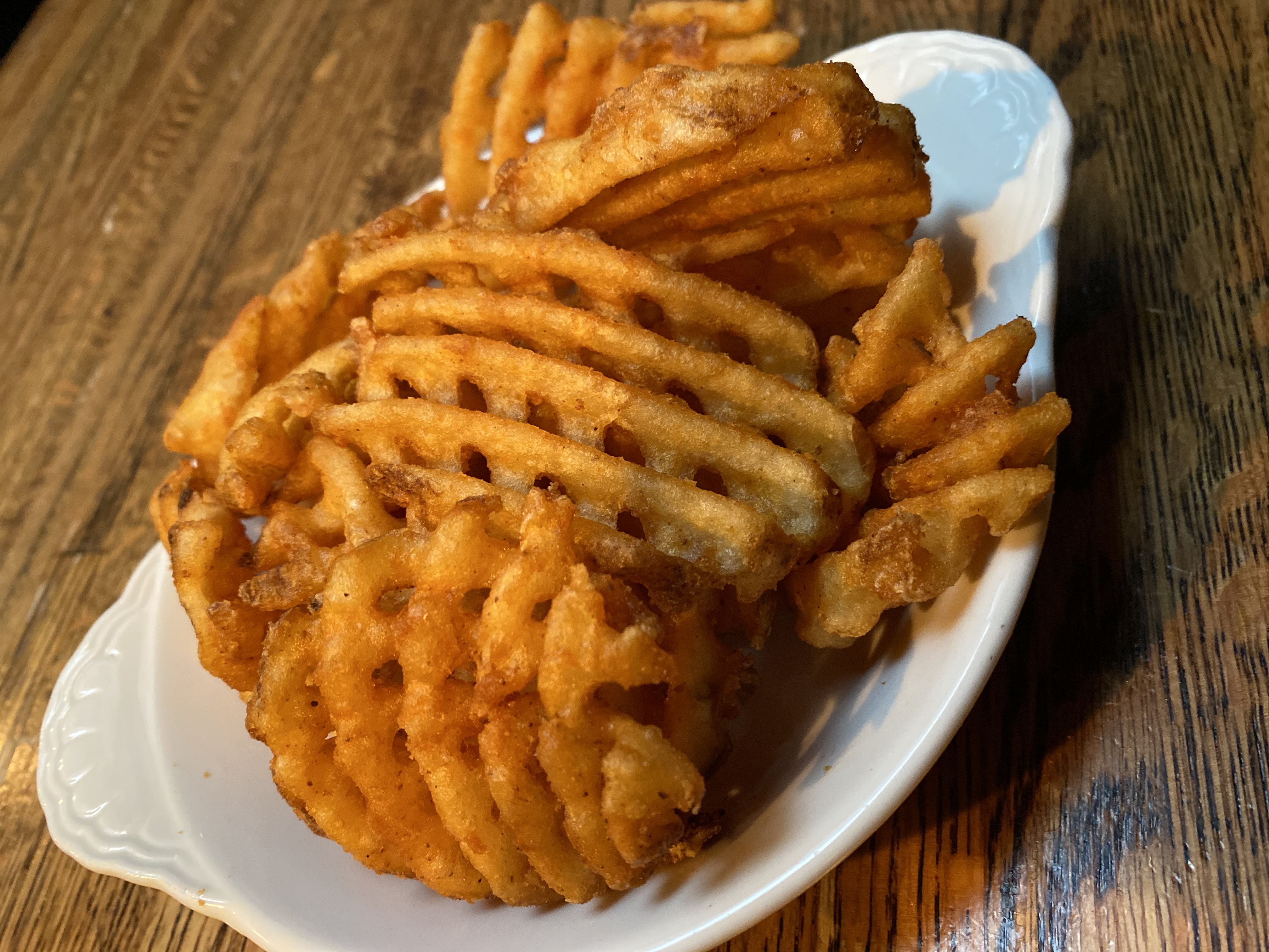 Order Waffle Fries food online from Black Bear Bar And Grill store, Hoboken on bringmethat.com