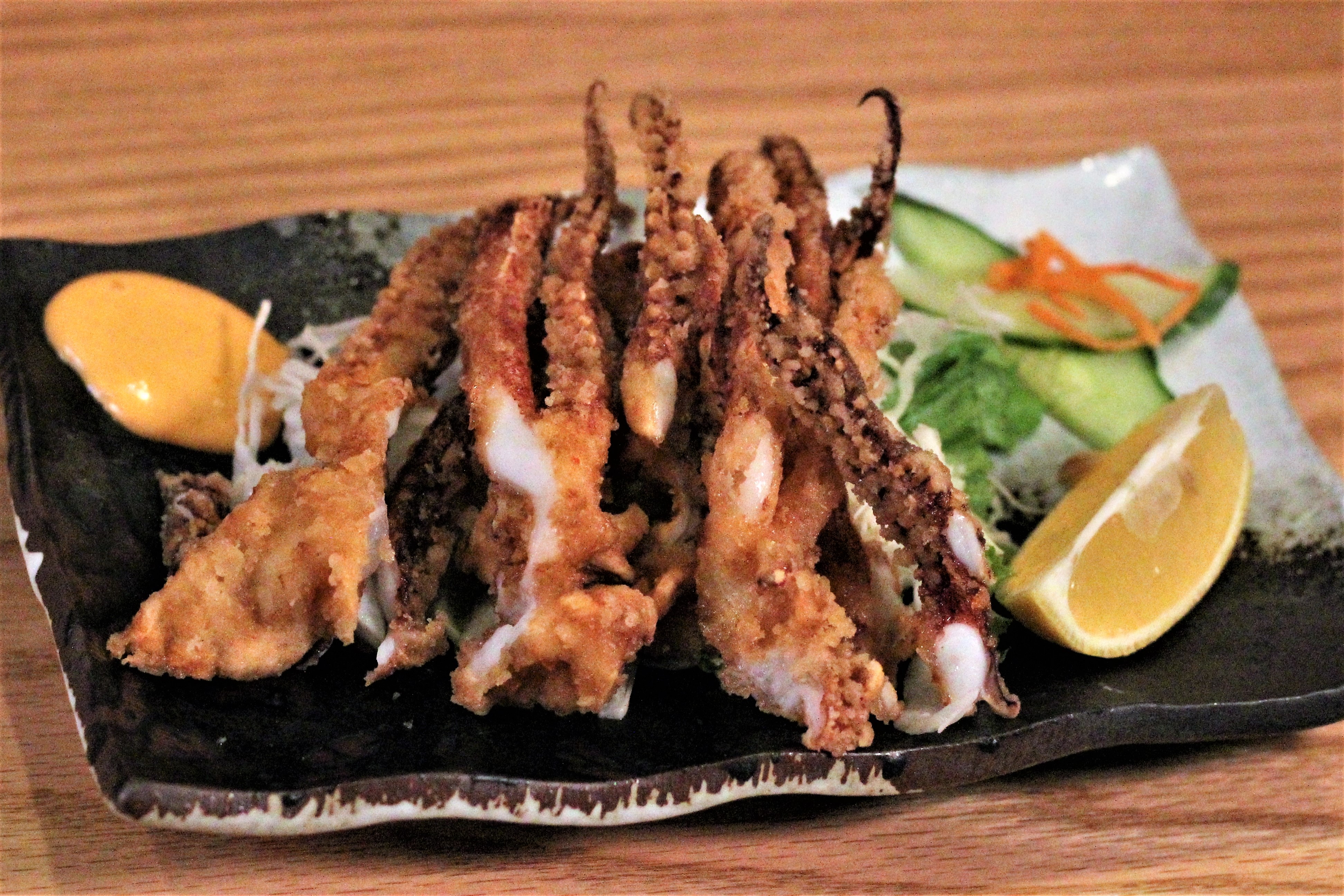 Order Ika Geso Karaage food online from Yoshi Ramen And Sushi store, Daly City on bringmethat.com