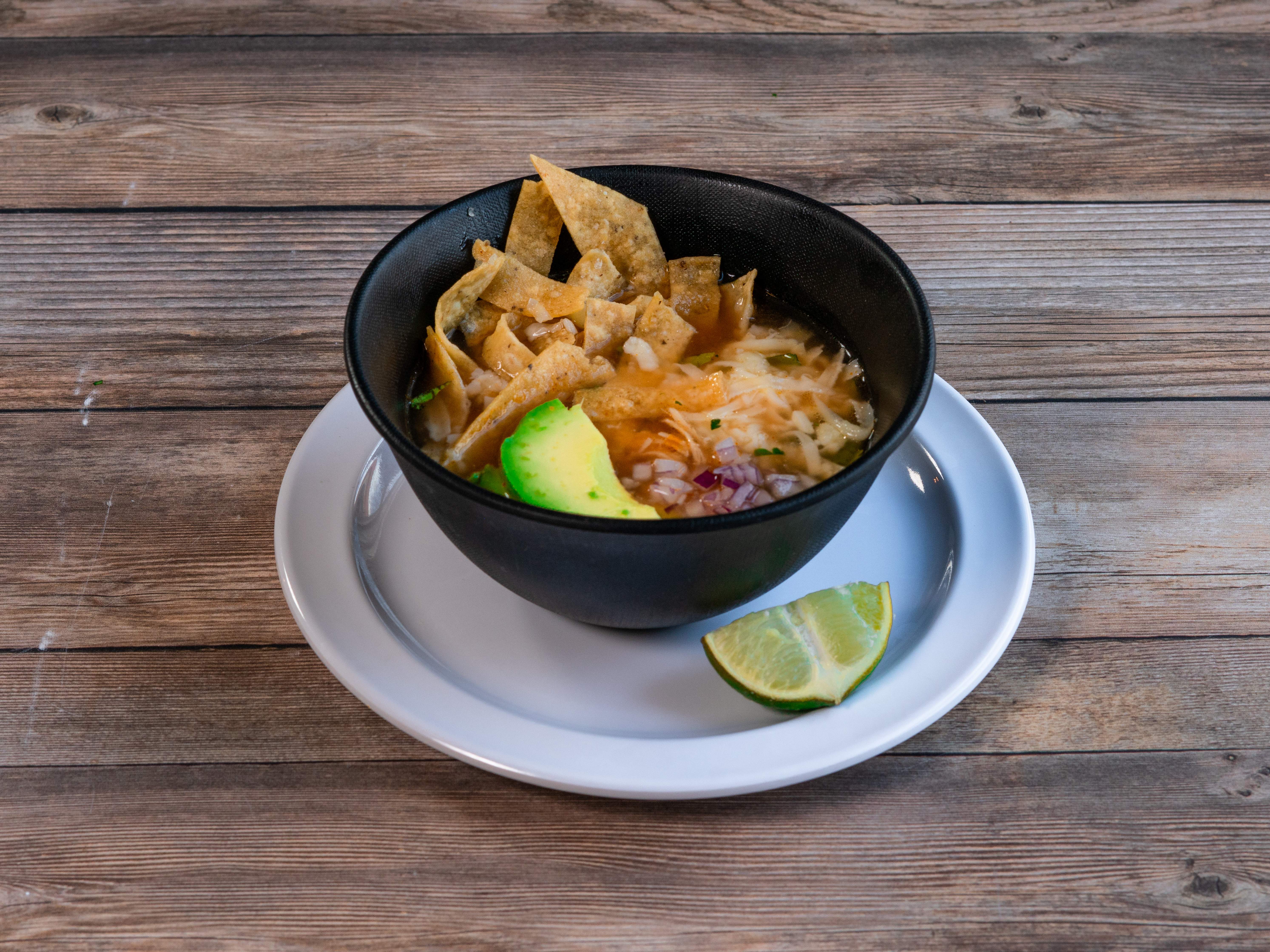 Order Tortilla Soup cup food online from La Morena Restaurant & Cantina store, El Paso on bringmethat.com