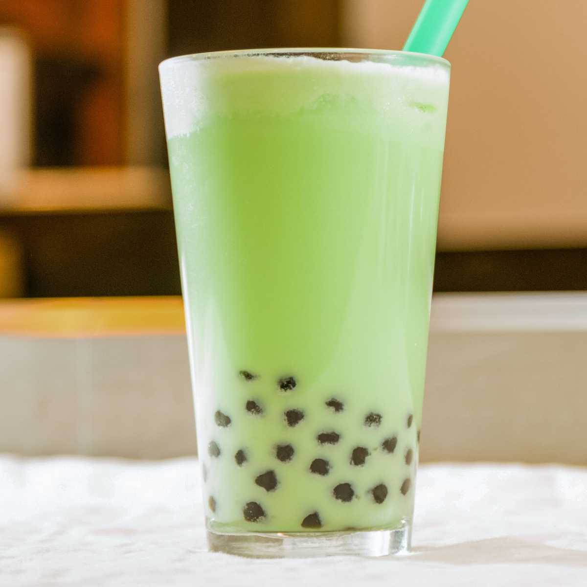 Order Ice Honeydew Pearl Milk Tea food online from Rising Sun Chinese Food store, Foothill Ranch on bringmethat.com