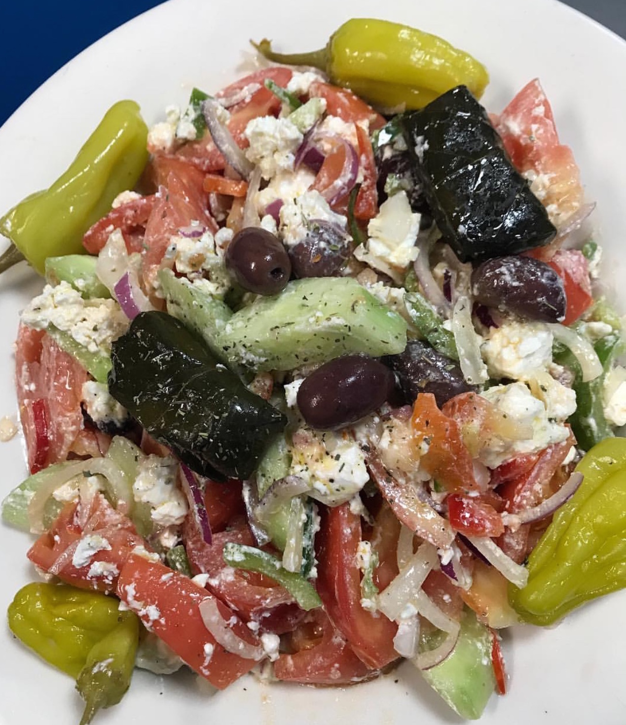 Order Horiatiki (Greek Salad) food online from Georges Souvlaki Of Astoria & More store, Brooklyn on bringmethat.com