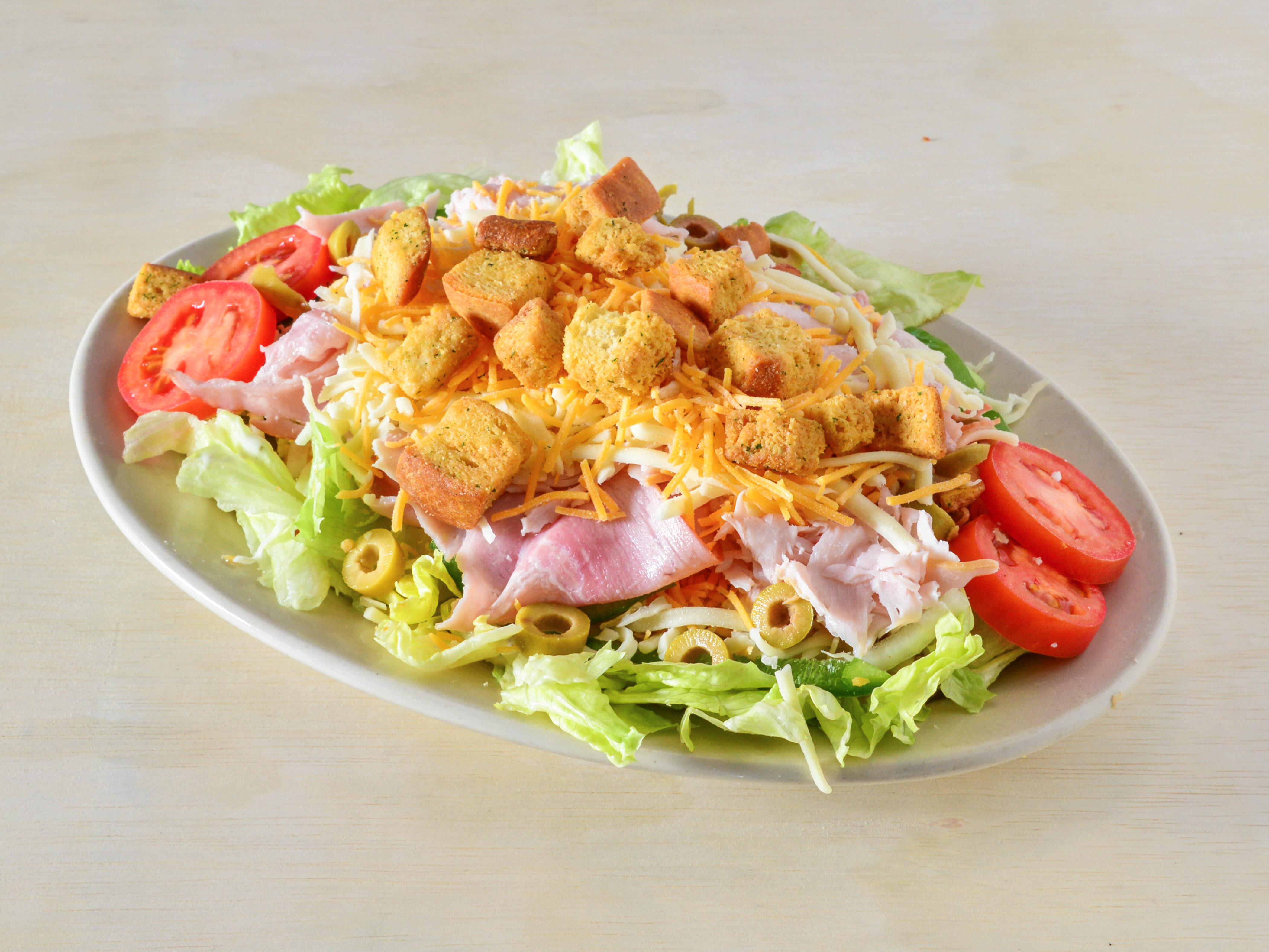 Order Chef's Salad food online from Cavoni Pizza & Grinders store, Battle Creek on bringmethat.com