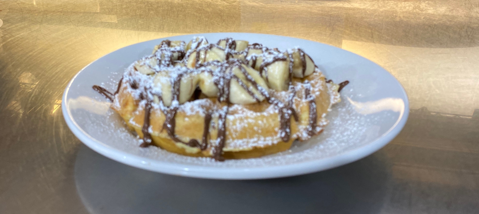 Order BANANA NUTELLA WAFFLE food online from The Point Pancake House store, Gurnee on bringmethat.com