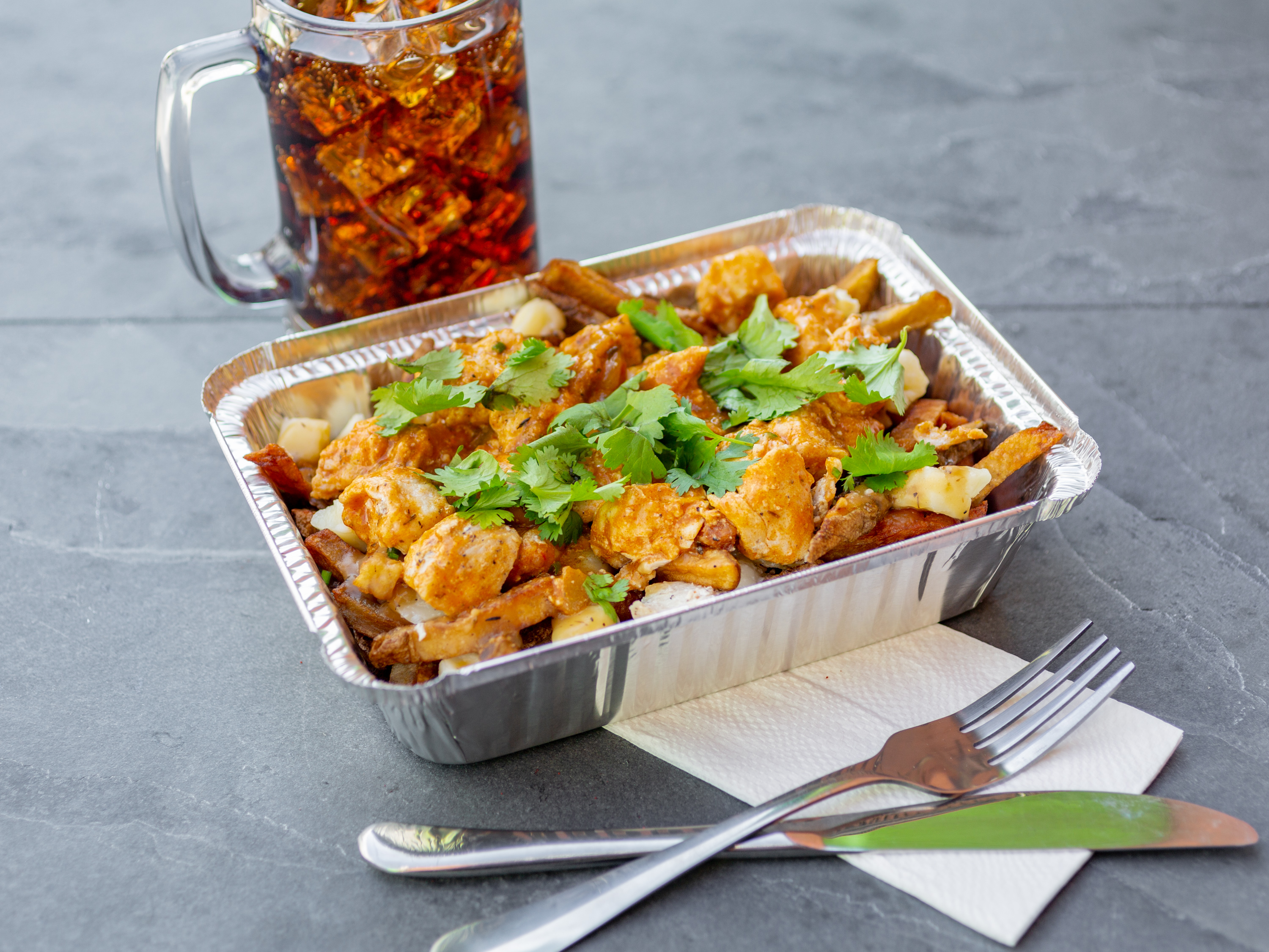 Order Chicken Tikka Masala food online from Poutine Brothers store, Culver City on bringmethat.com