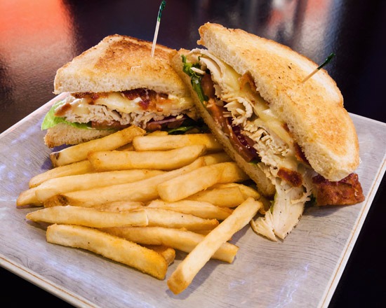 Order Turkey Club Sandwich food online from Just Wing It store, Bakersfield on bringmethat.com