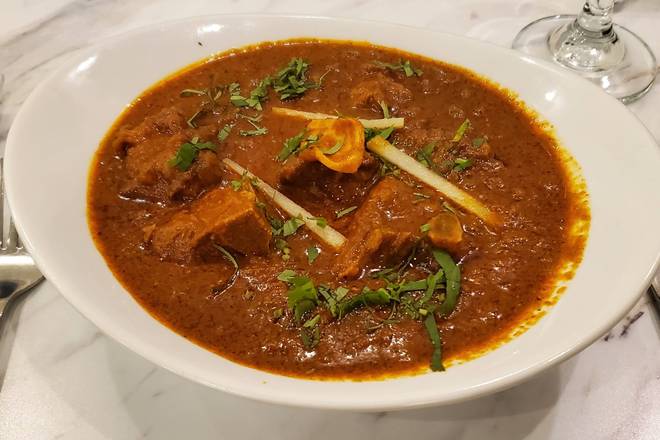 Order Goat Curry food online from Melange Indo-Chinese Cuisine store, Parsippany-Troy Hills on bringmethat.com