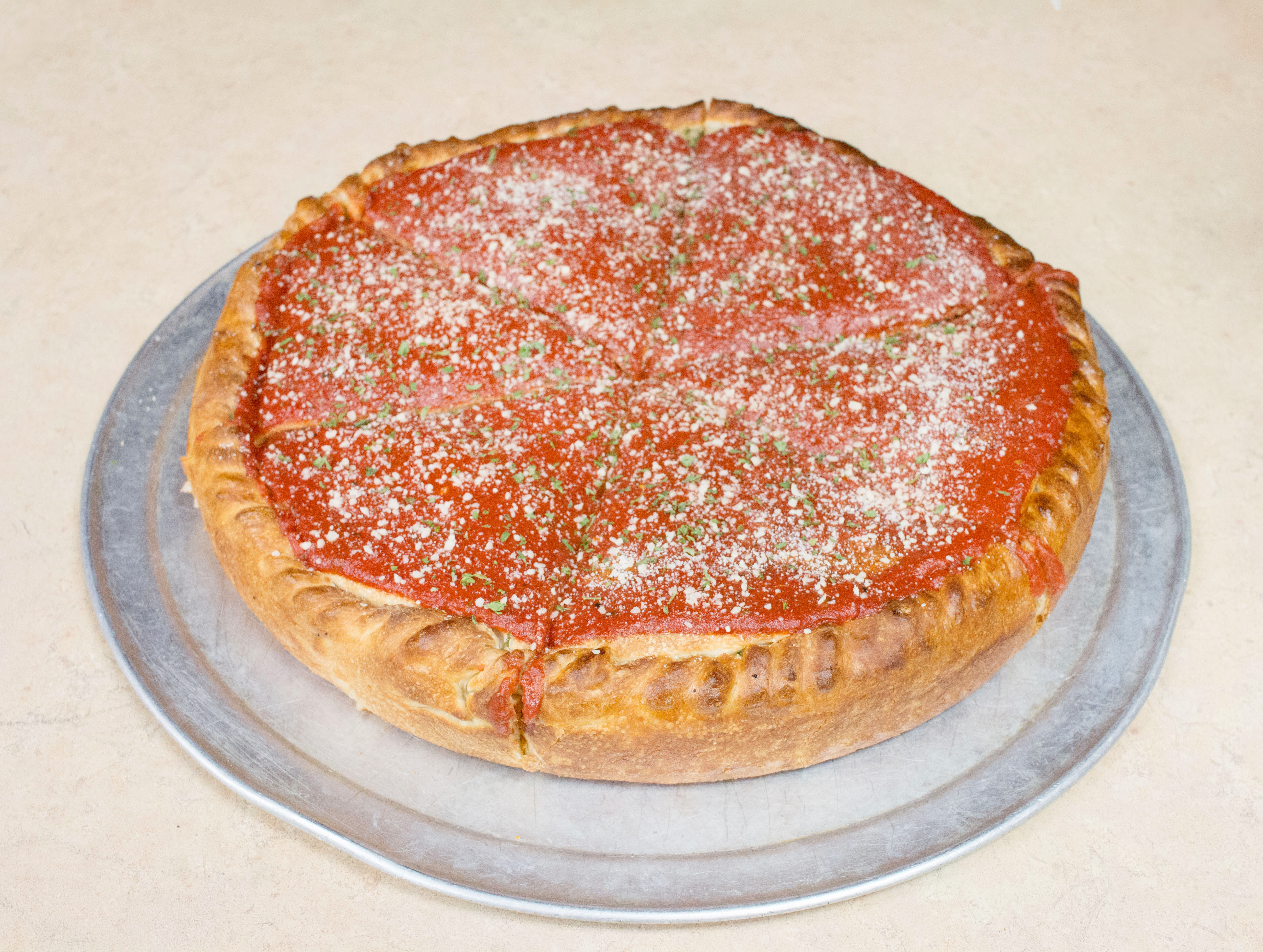 Order Deep Dish Chicago Style with 5 Toppings Pizza food online from Grapes And Hops Market store, Waterford on bringmethat.com