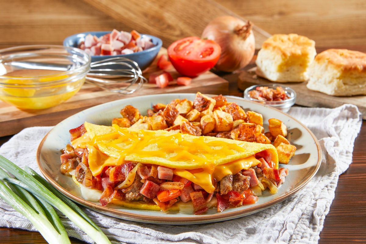 Order Three Meat & Cheese Omelet food online from Bob Evans Restaurant store, Jacksonville on bringmethat.com