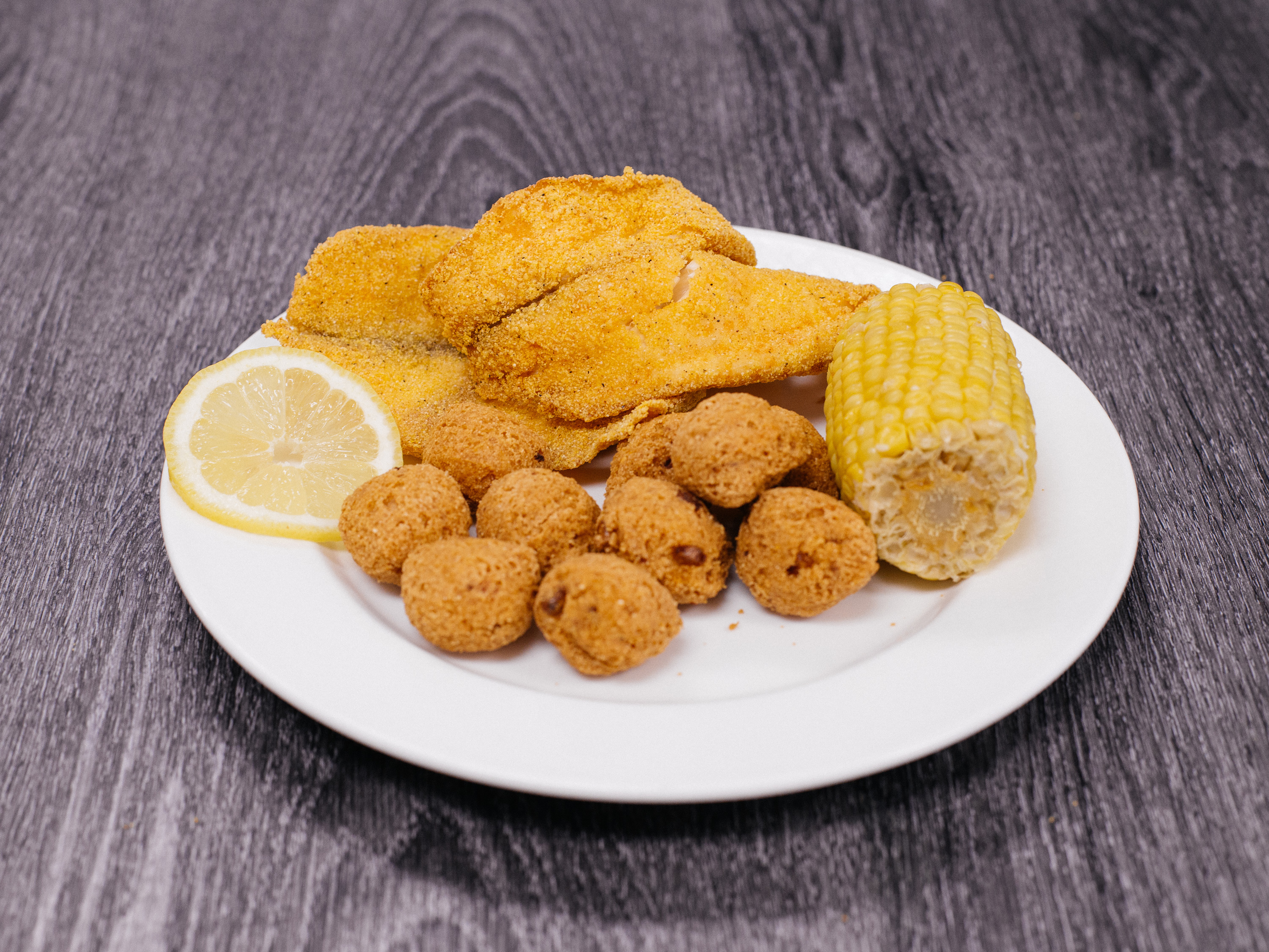 Order Fried Tilapia food online from Let's Fry This store, Las Vegas on bringmethat.com