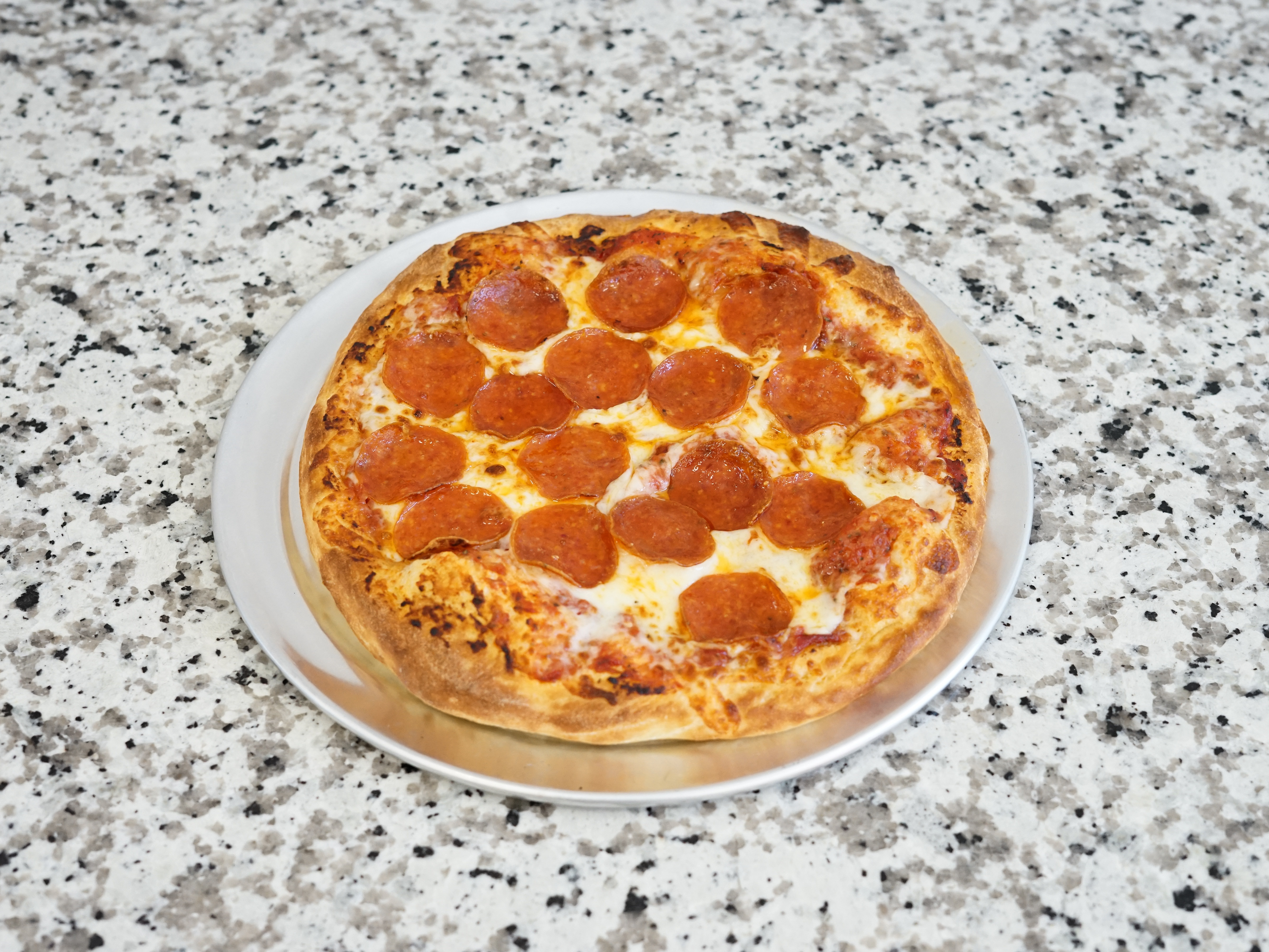 Order Pepperoni Lovers food online from Tasty Pizza store, San Jose on bringmethat.com