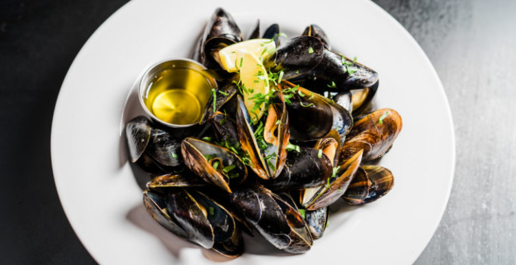 Order Skillet Smoked Organic Mussels* food online from Citizen Public House & Oyster Bar store, Boston on bringmethat.com