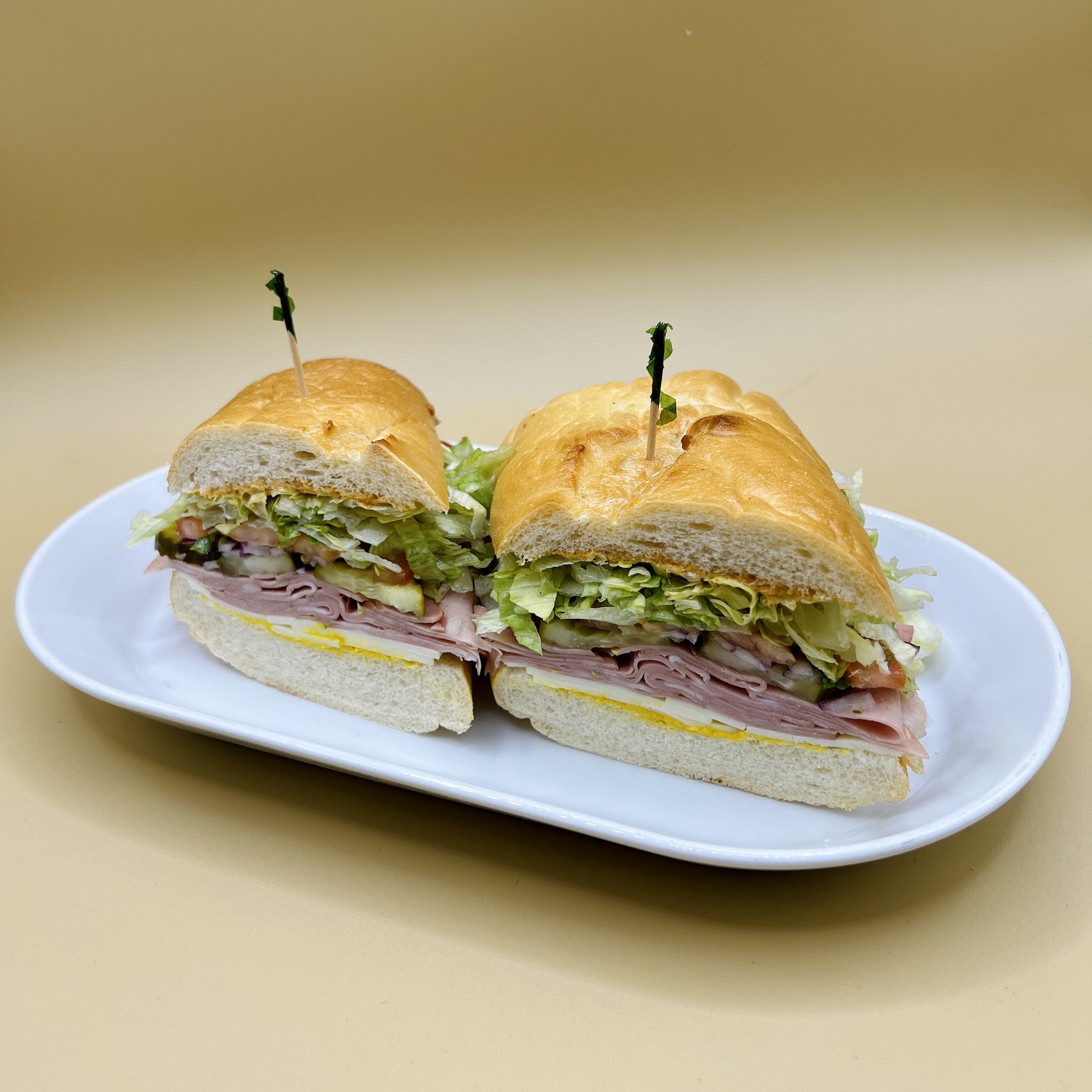 Order 8. Mortadella with Pistachios Sandwich food online from Spreadz store, Santa Clara on bringmethat.com