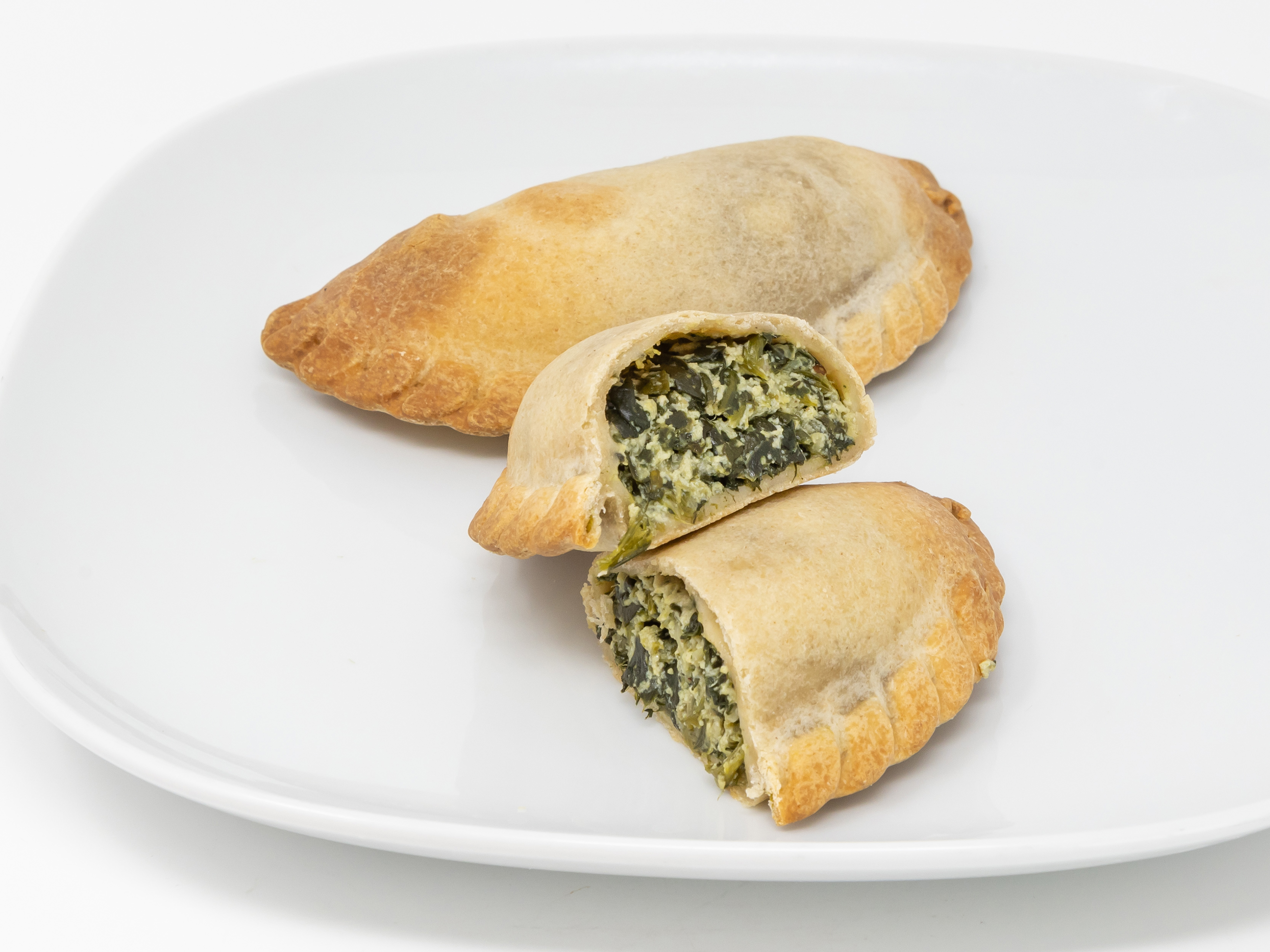 Order 2 Piece Spinach and Ricotta Empanadas food online from Freakin’ Vegan store, Prospect Park on bringmethat.com