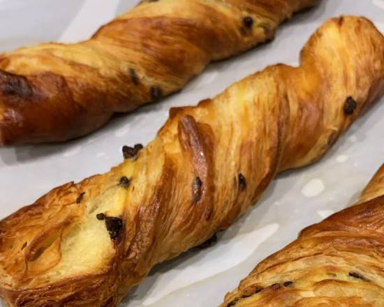 Order Belgium Chocolate Twist Croissant food online from L'Artisan Cafe &amp; Bakery store, Providence on bringmethat.com