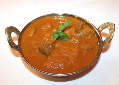 Order Lamb Curry food online from Raaga Tandoor store, Burke on bringmethat.com
