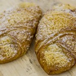 Order Almond Croissant (2 oz.) food online from Croissant Bakery store, Norcross on bringmethat.com