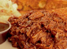 Order BBQ Pulled Pork food online from Texas Corral store, Kalamazoo on bringmethat.com