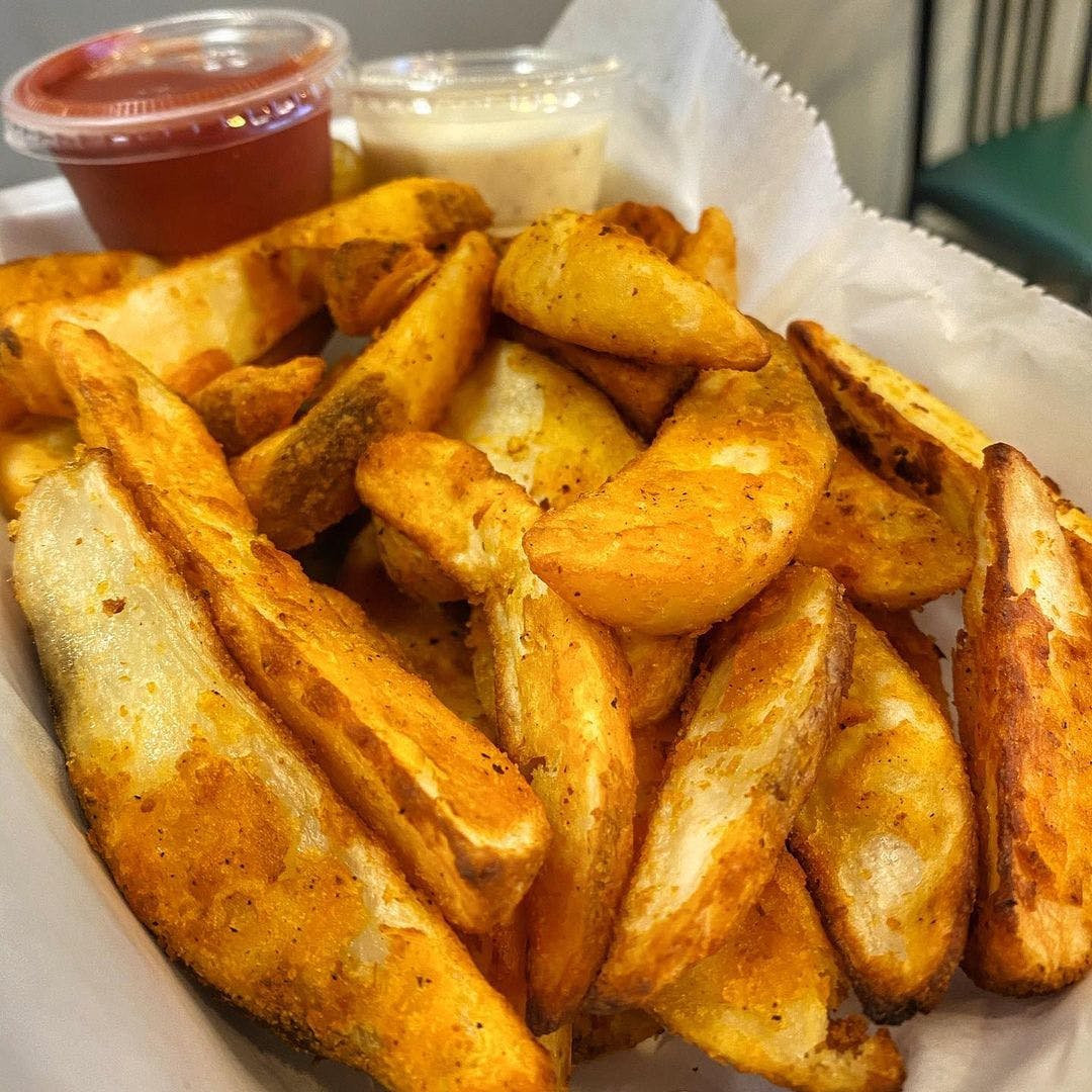 Order Potato Wedges - Appetizer food online from Double Or Nothin Pizza store, Ontario on bringmethat.com