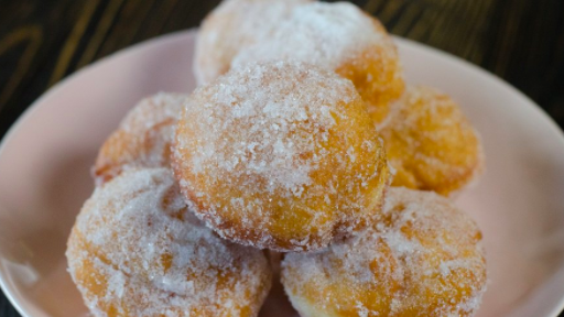 Order 10 Sweet Donuts food online from Gourmet Cajun Seafood & Grill store, Allentown on bringmethat.com