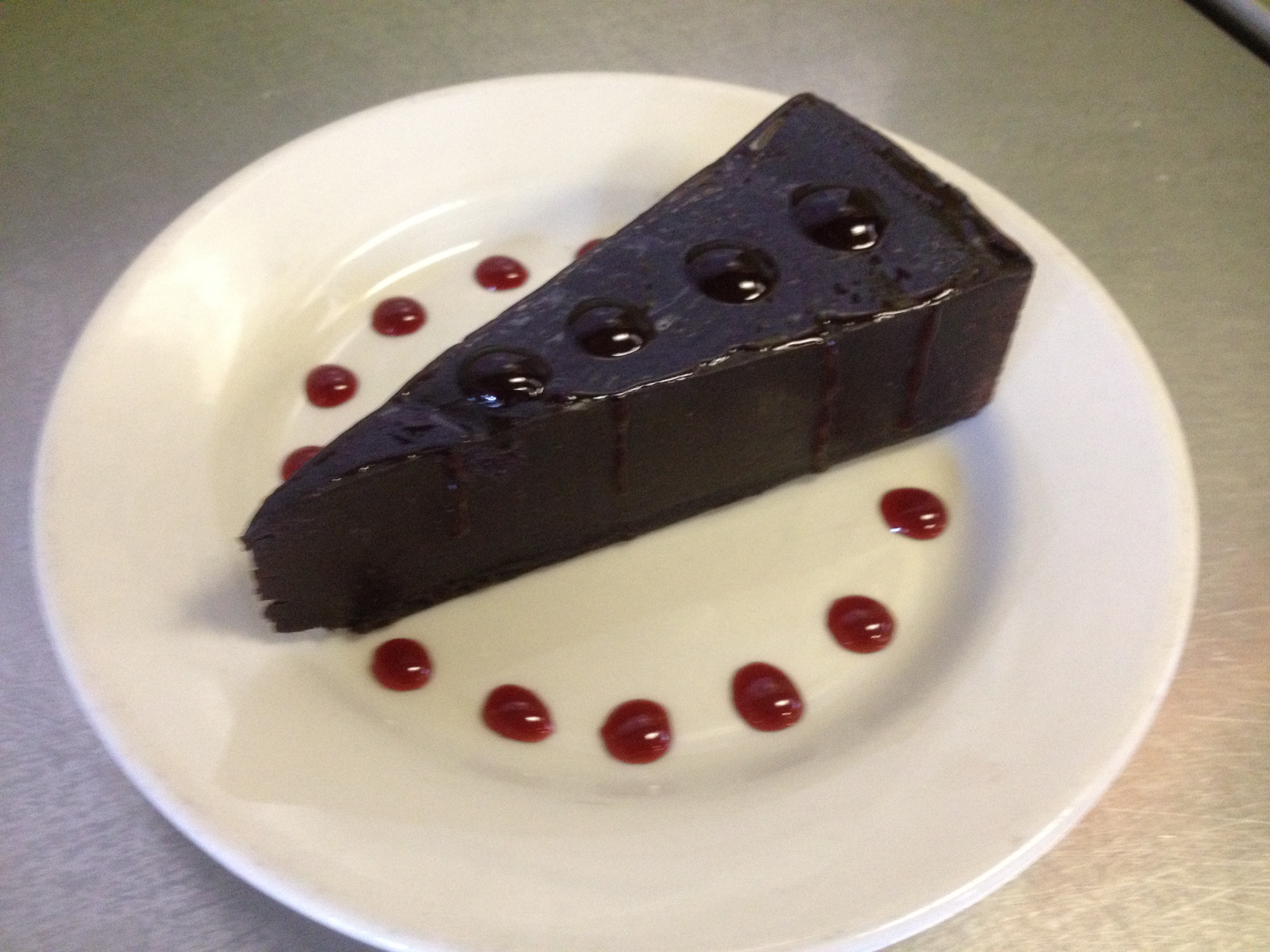 Order Chocolate Ganache Torte food online from Romes Pizza store, Helotes on bringmethat.com